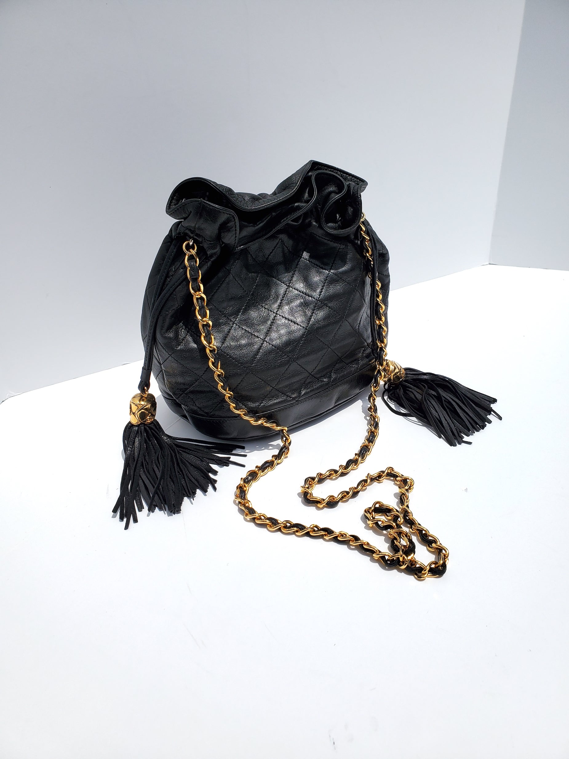 Chanel 24k Gold Black Leather Quilted Bucket Bag - Rovelle Bags