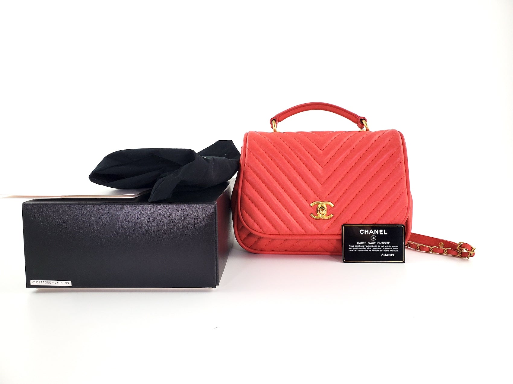 Chanel Red Reverse Chevron Quilted Round Flap Bag - Rovelle Bags