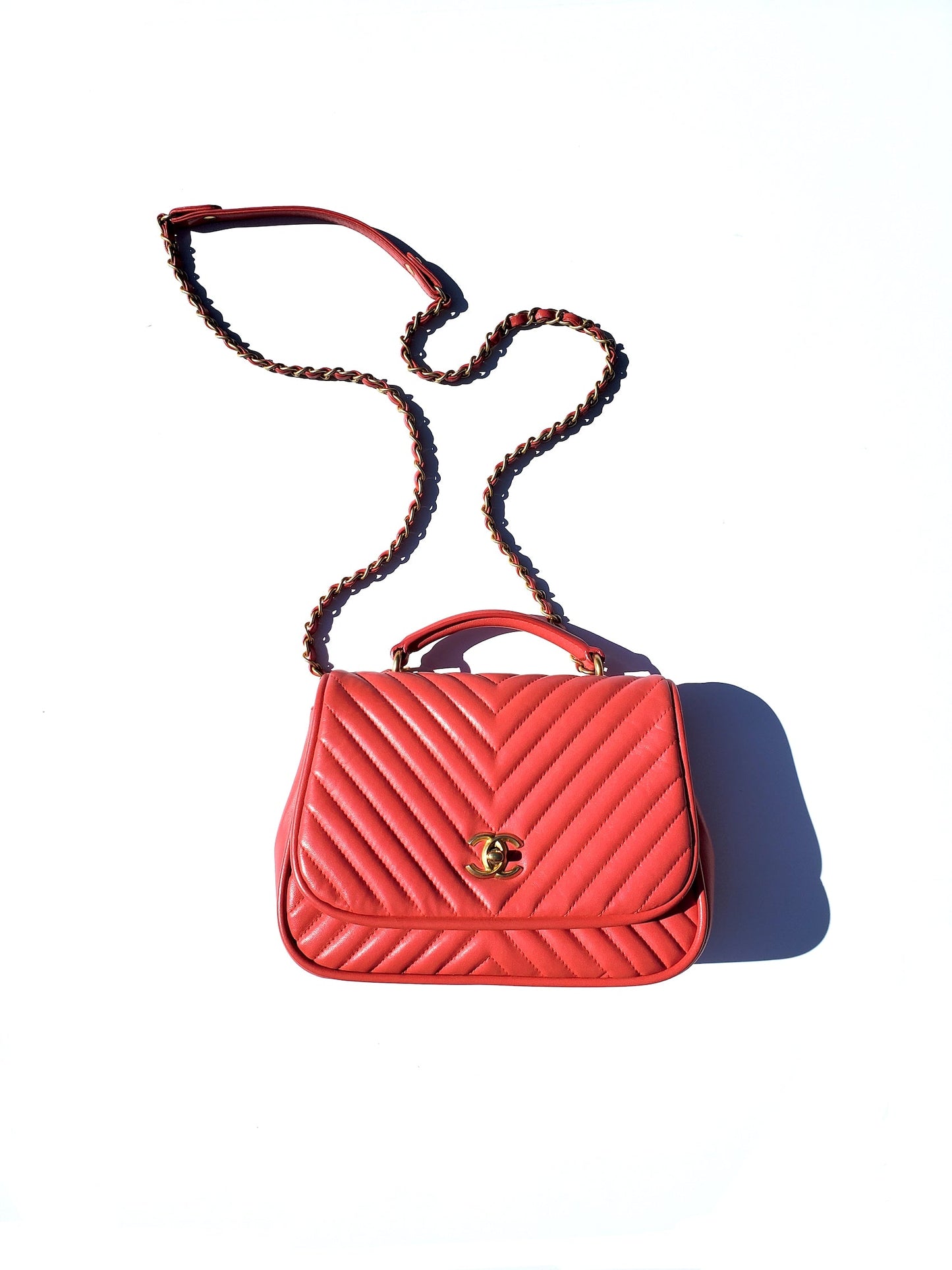 Chanel Red Reverse Chevron Quilted Round Flap Bag - Rovelle Bags