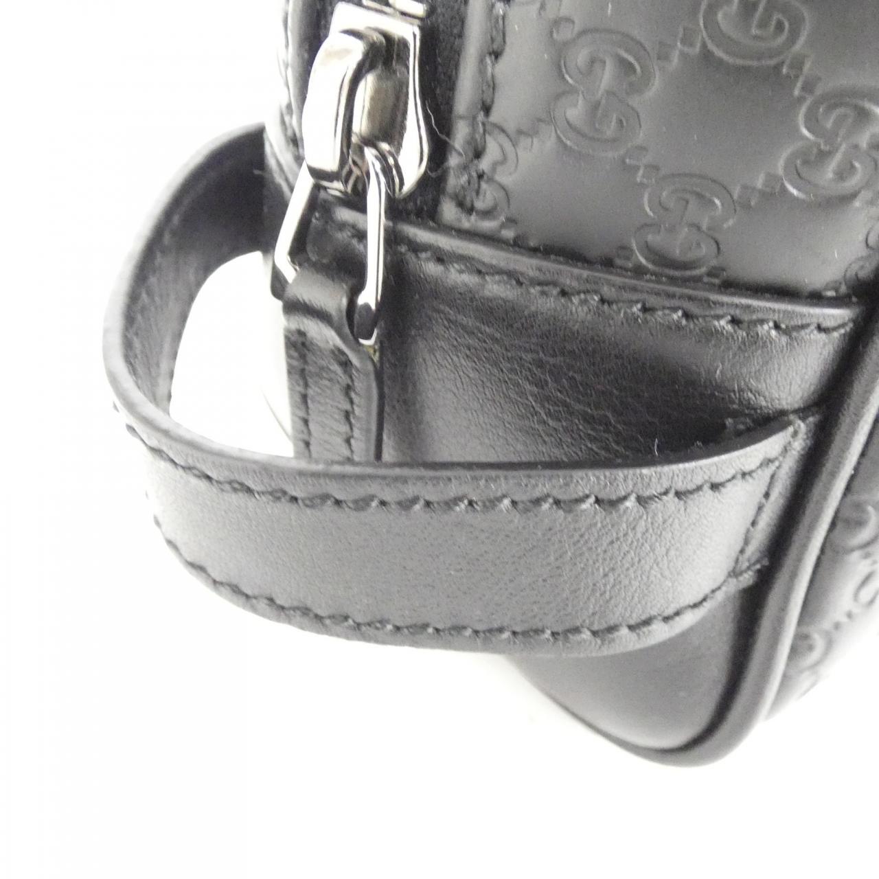 Gucci Microguccissima Leather Clutch Bag