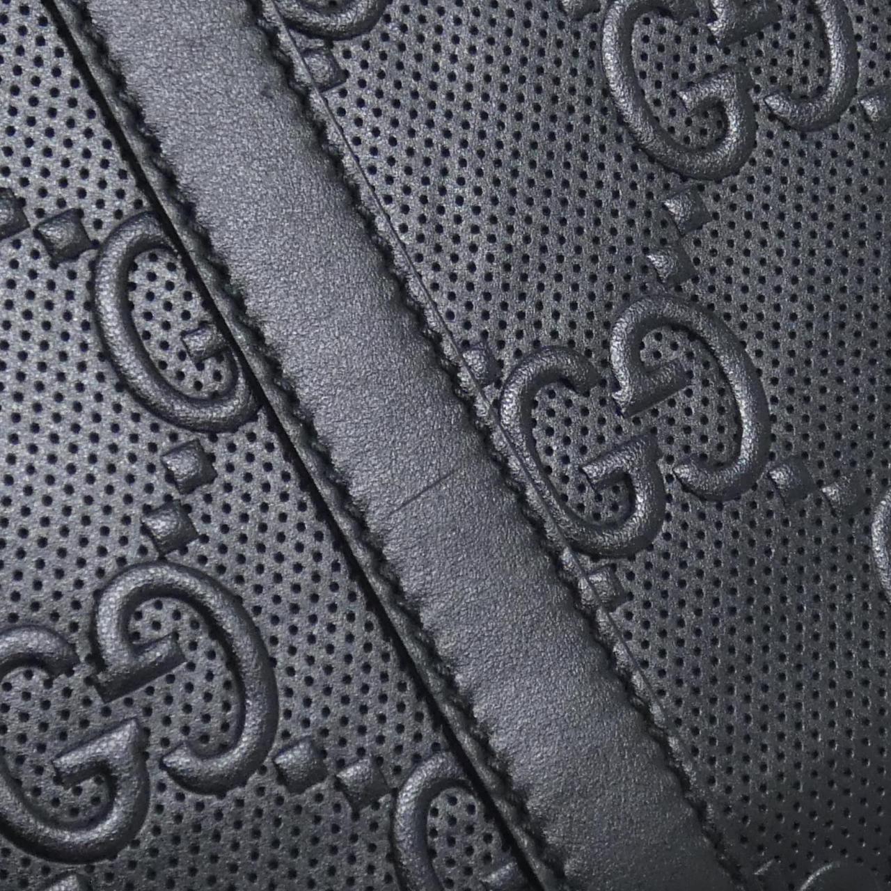 Gucci GG Embossed Leather Bag