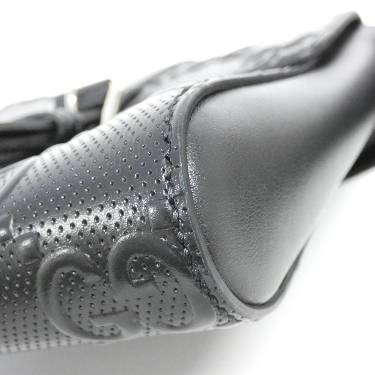 Gucci GG Embossed Leather Waist Bag