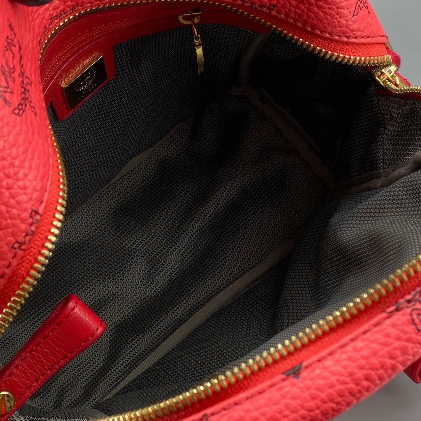 MCM Coral Red Visetos Mini Backpack