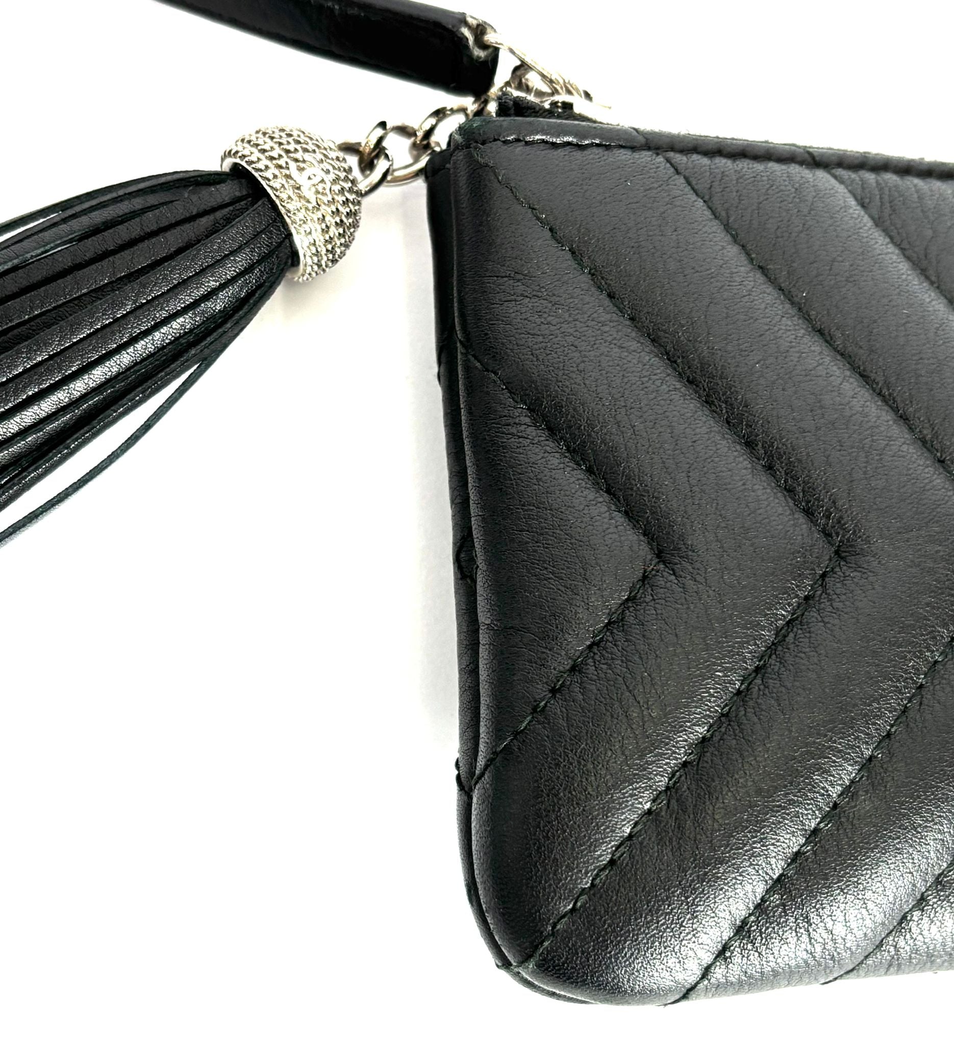 Chanel LEATHER CHEVRON TASSEL Pouch Bag - Rovelle Bags
