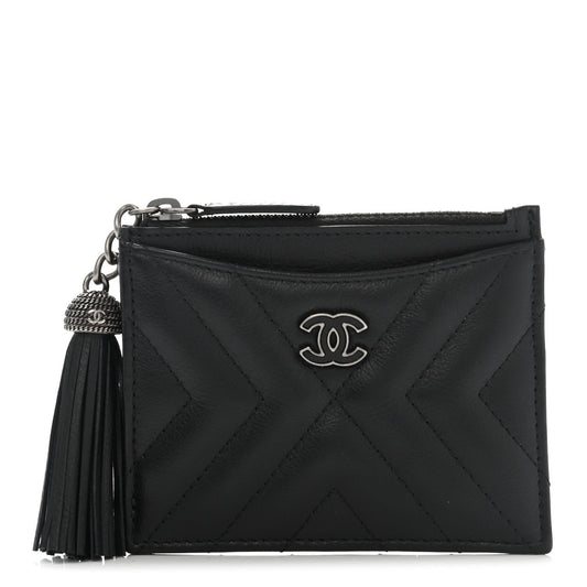 Chanel LEATHER CHEVRON TASSEL Pouch Bag - Rovelle Bags