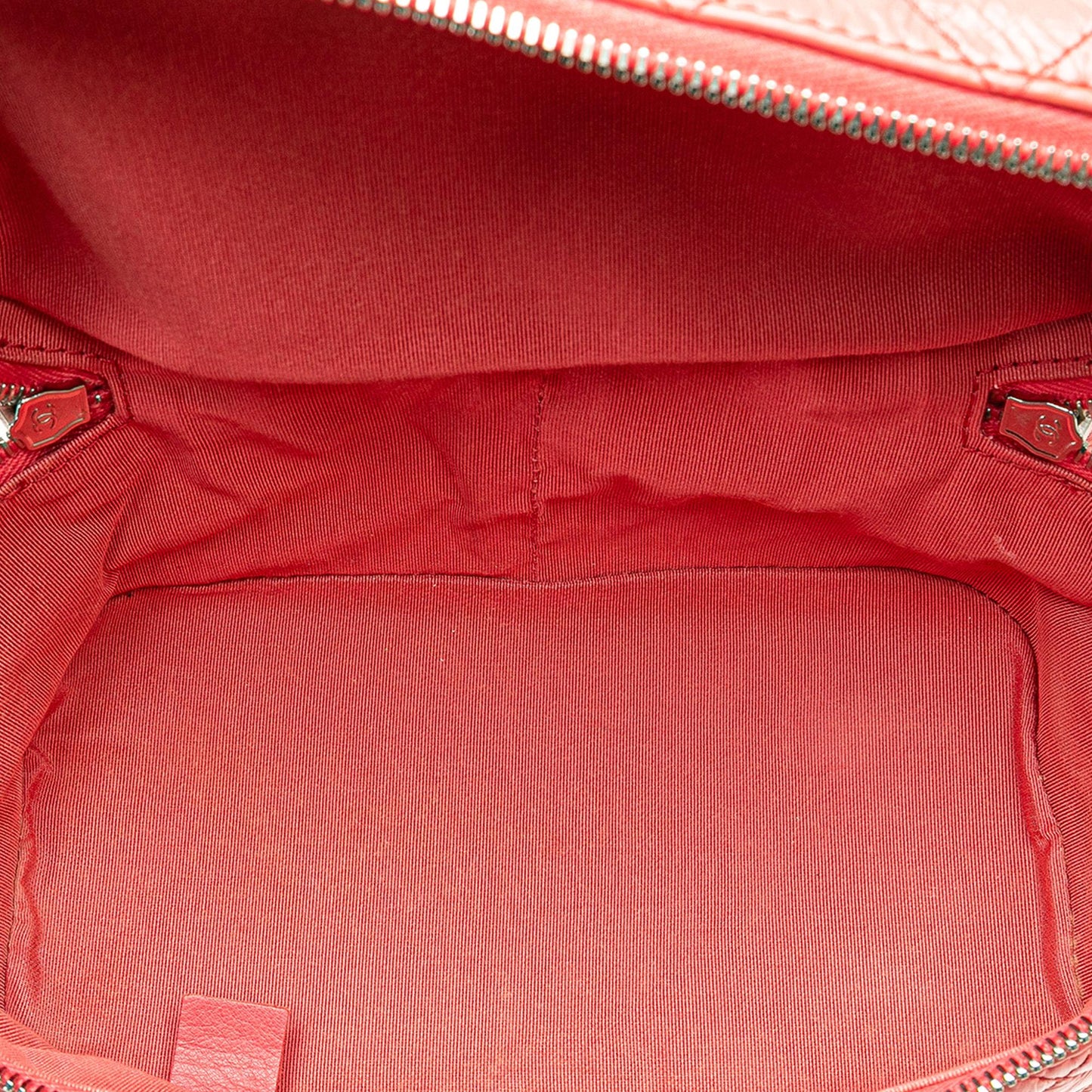 Chanel Quilted Lambskin and Backpack - Rovelle Bags