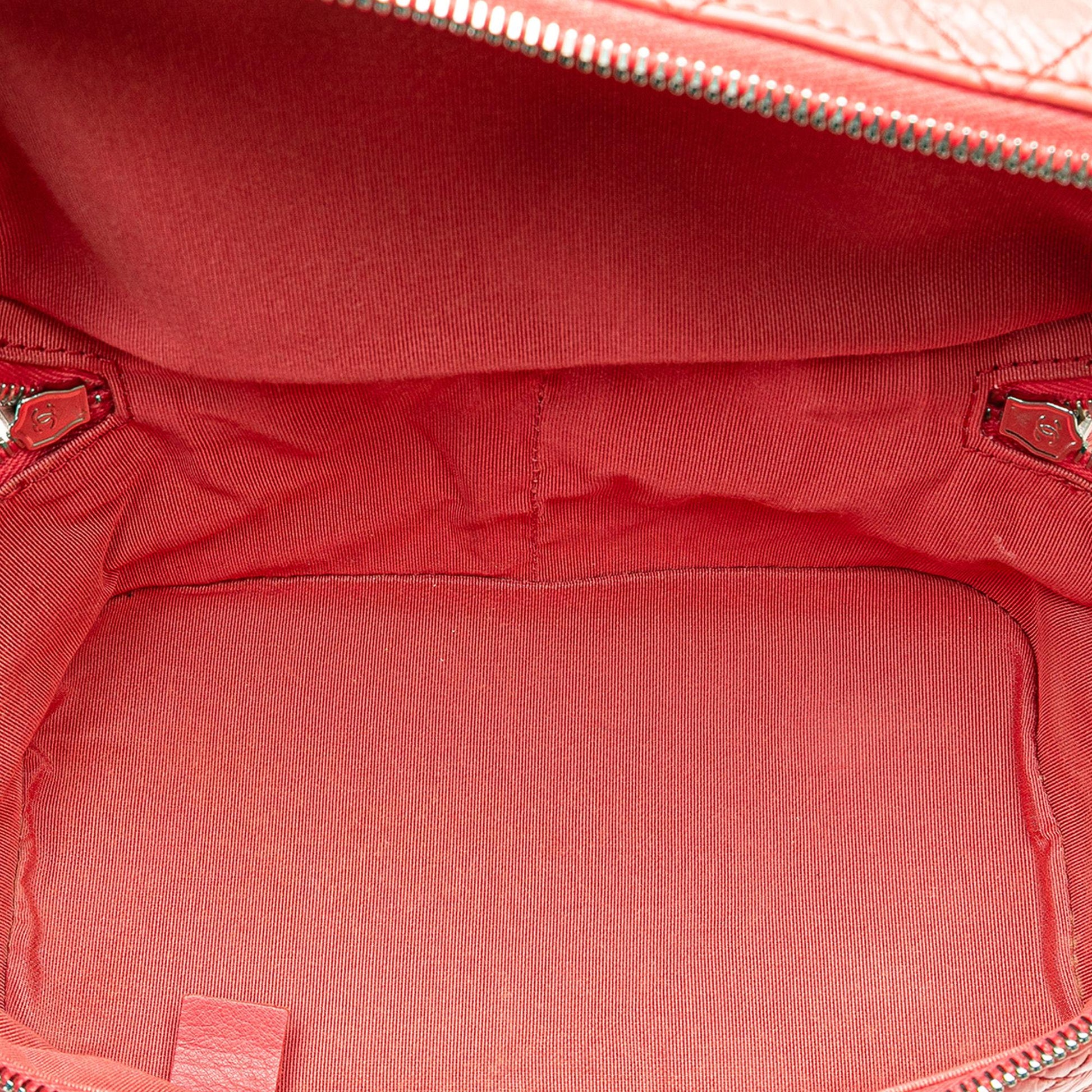 Chanel Quilted Lambskin and Backpack - Rovelle Bags