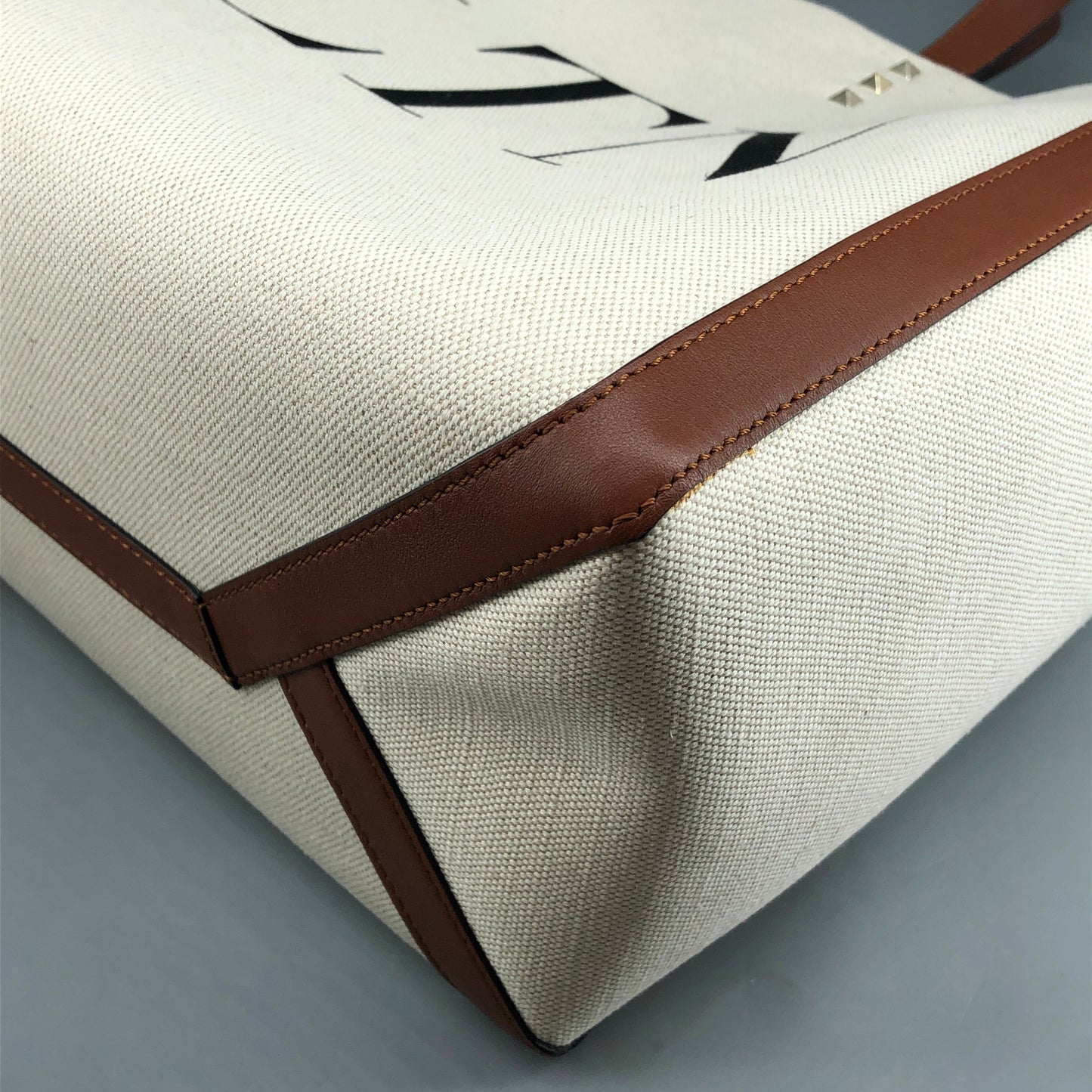 Valentino Garavani VLTN Grande Plage tote features canvas Cream/Caramel