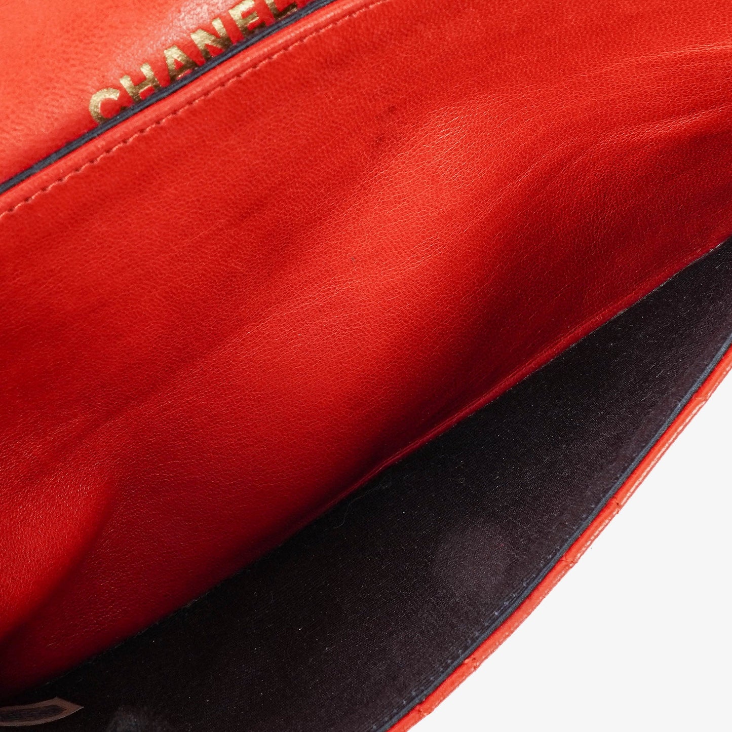 Chanel  Classic Medium Double Flap Bag in Quilted Red Lambskin with 24-karat Gold-Plated Hardware