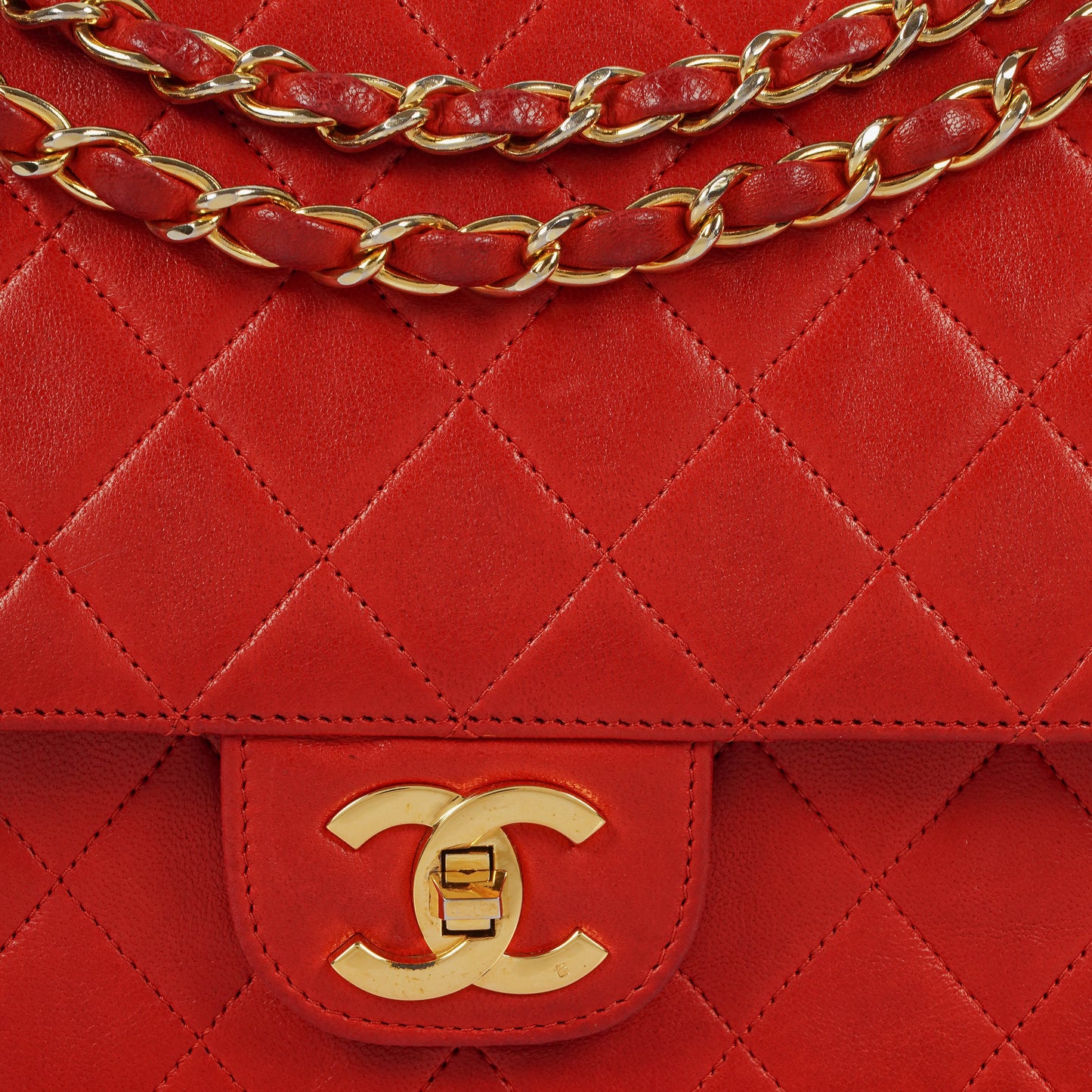 Chanel  Classic Medium Double Flap Bag in Quilted Red Lambskin with 24-karat Gold-Plated Hardware