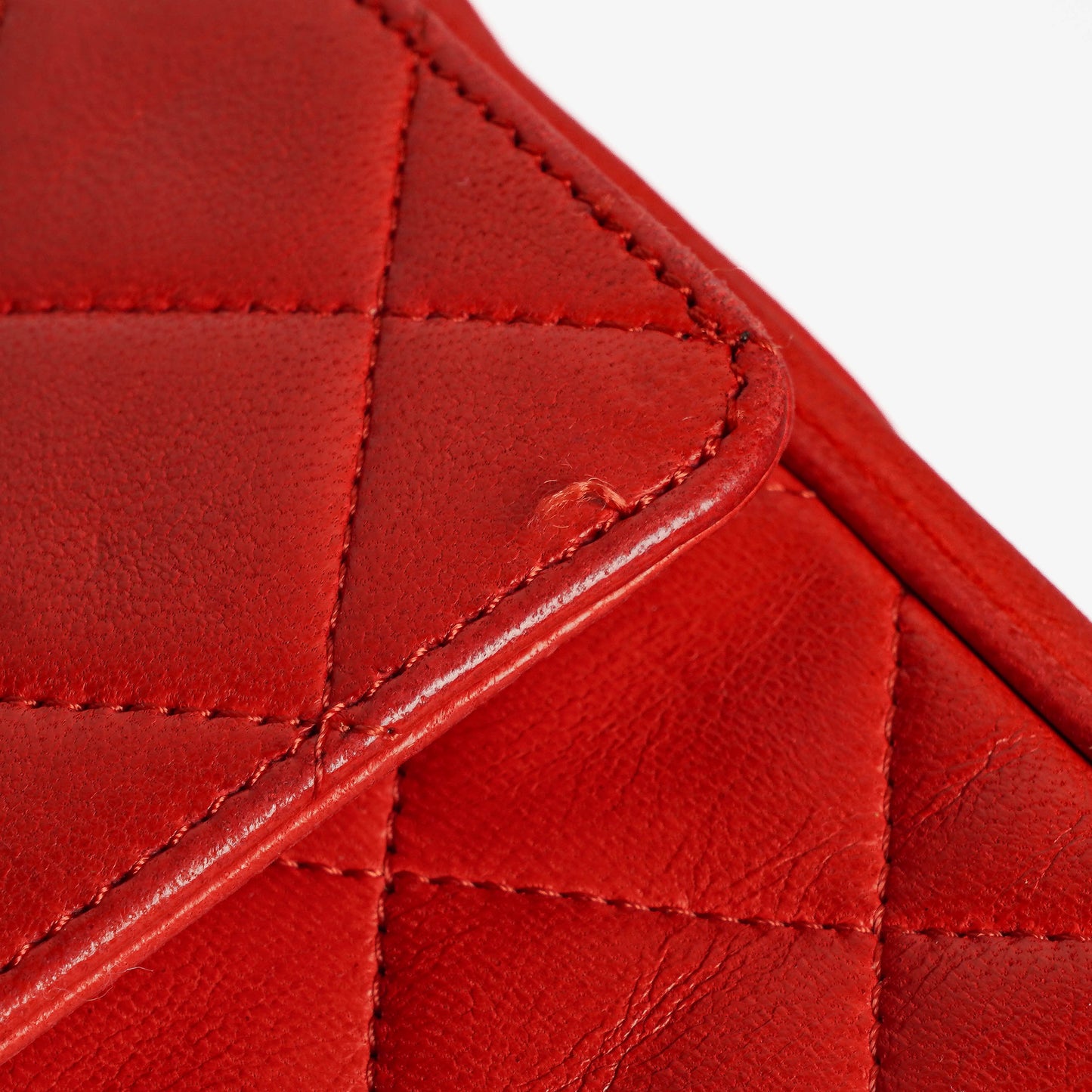 Chanel  Classic Medium Double Flap Bag in Quilted Red Lambskin with 24-karat Gold-Plated Hardware