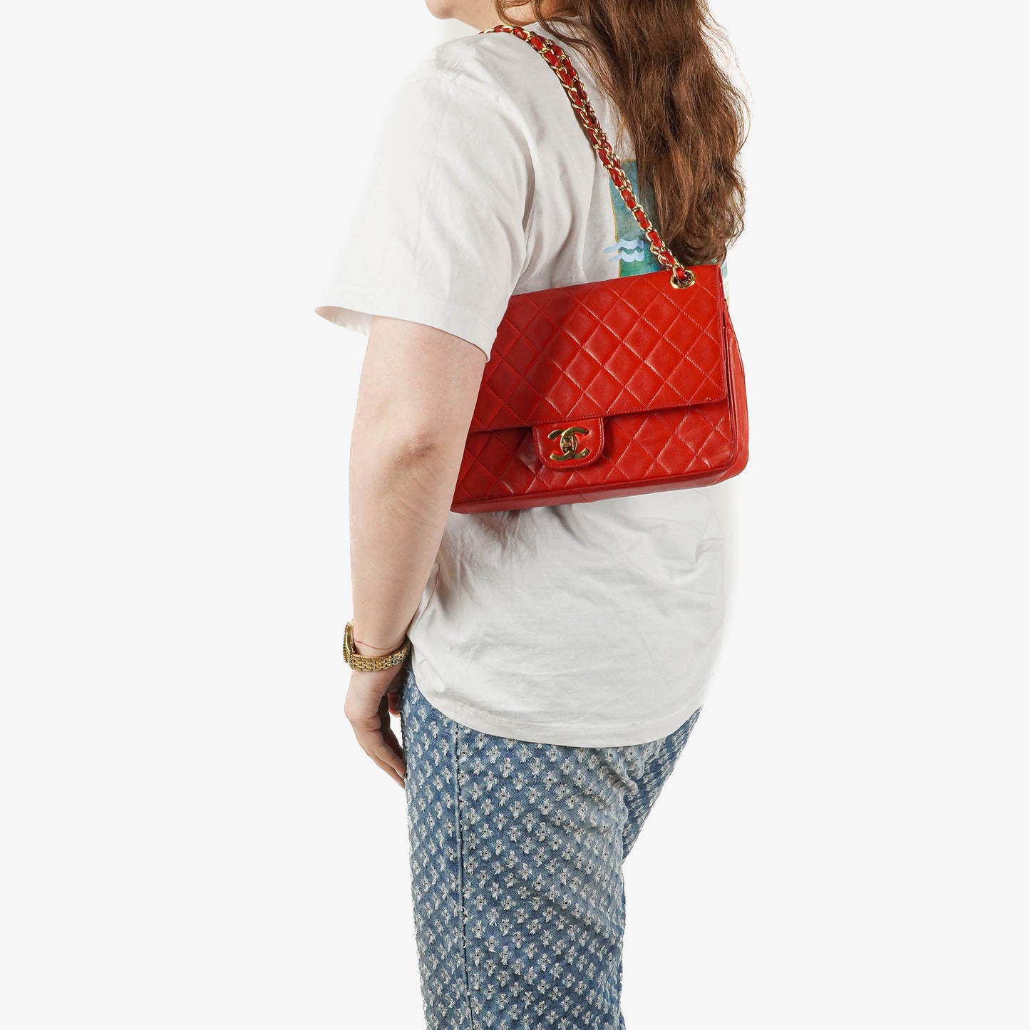 Chanel  Classic Medium Double Flap Bag in Quilted Red Lambskin with 24-karat Gold-Plated Hardware
