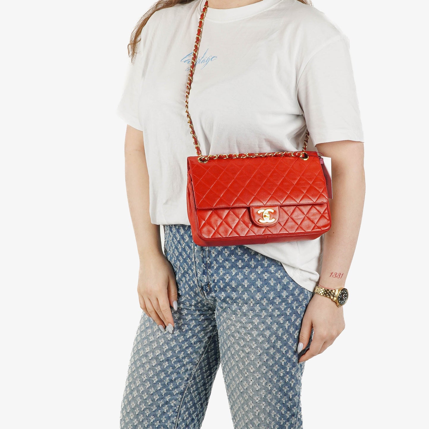 Chanel  Classic Medium Double Flap Bag in Quilted Red Lambskin with 24-karat Gold-Plated Hardware