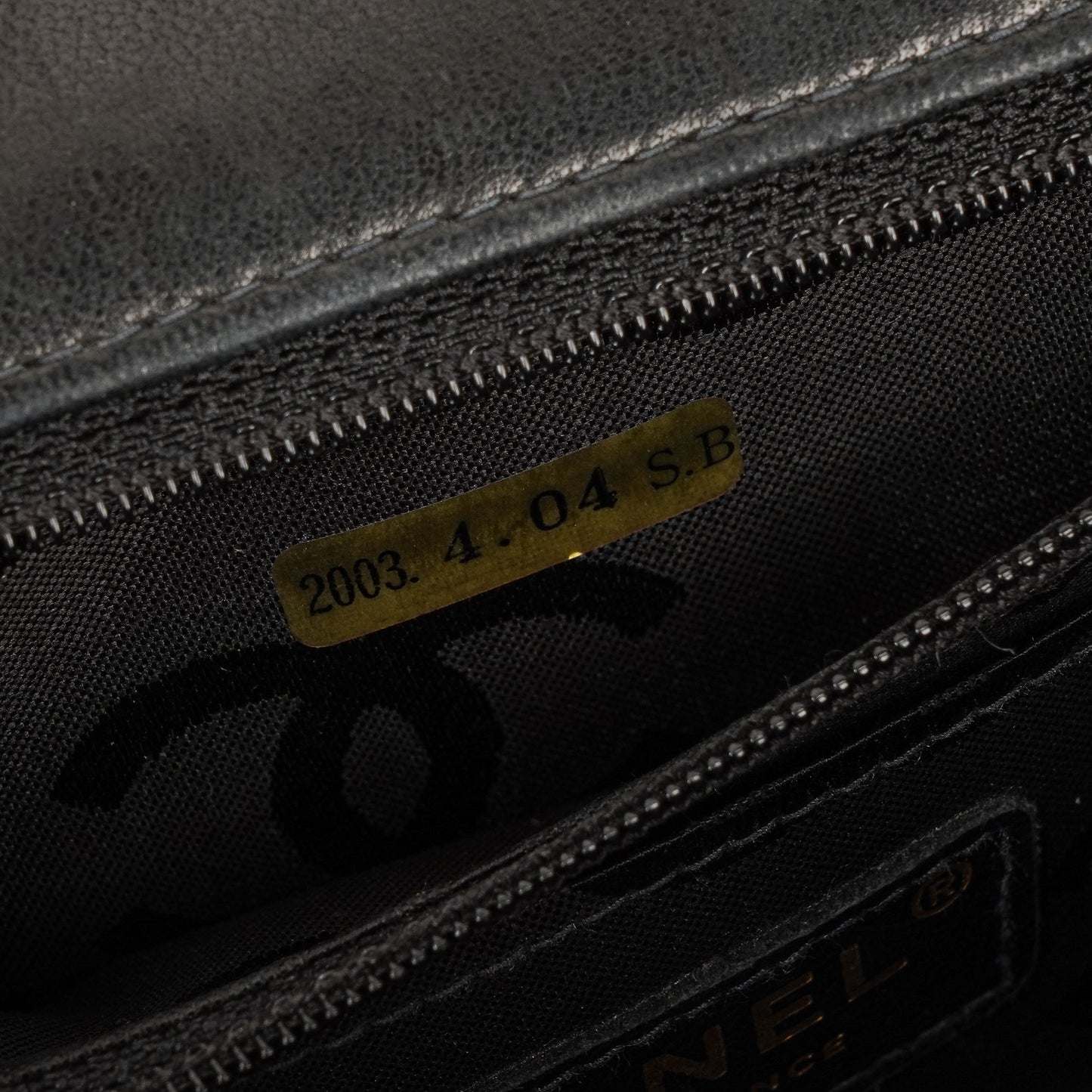 Chanel Camellia Perforated Black Patent Leather Flap Bag