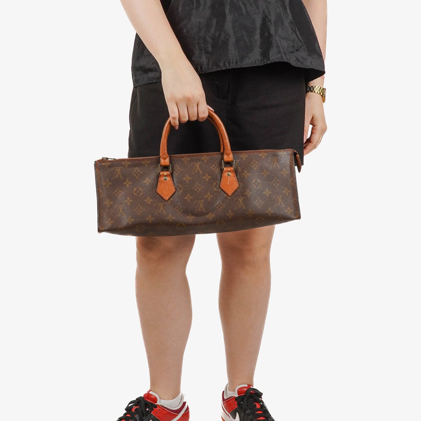 Louis Vuitton Sac Triangle Monogram Handbag