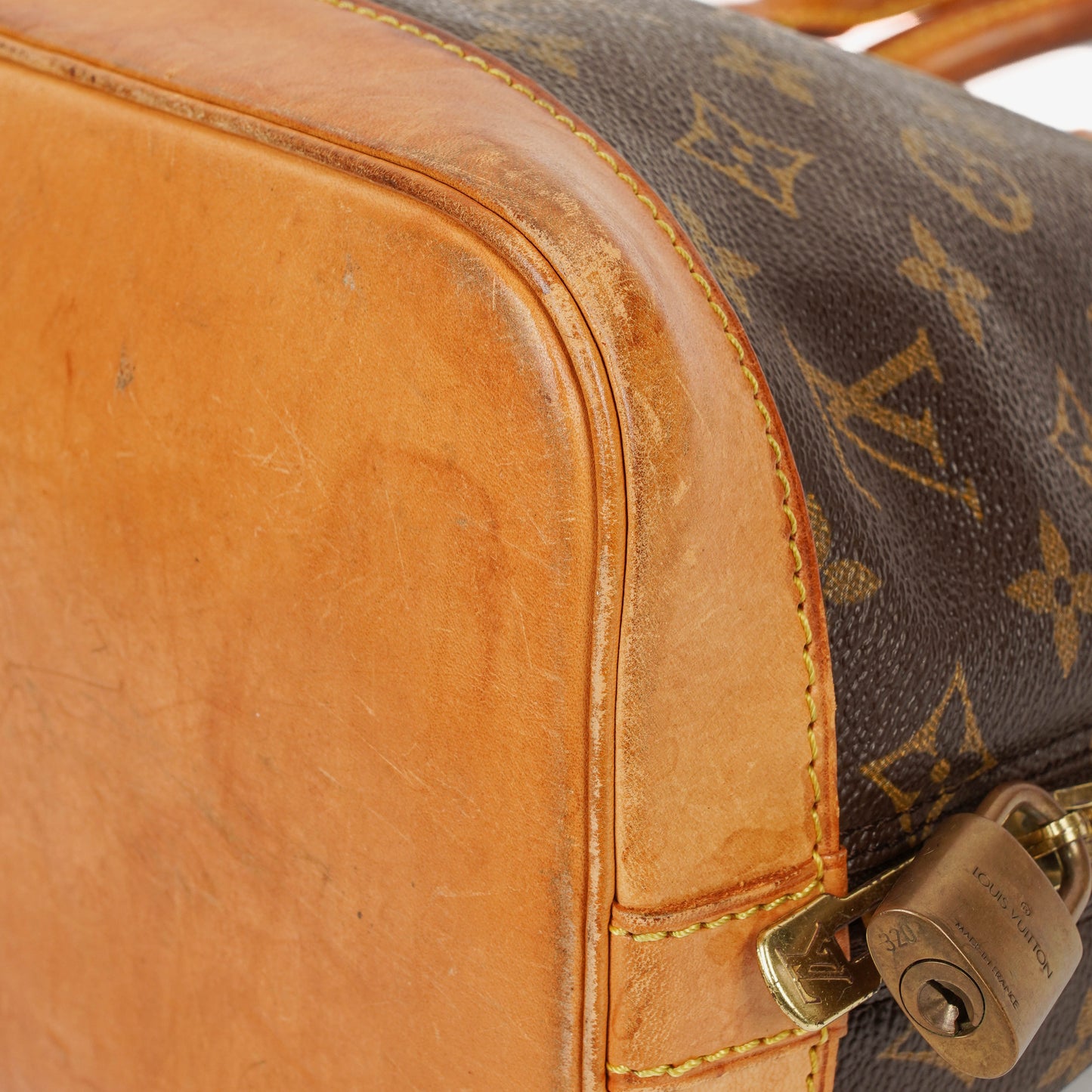 Louis Vuitton Alma PM Monogram Canvas Handbag