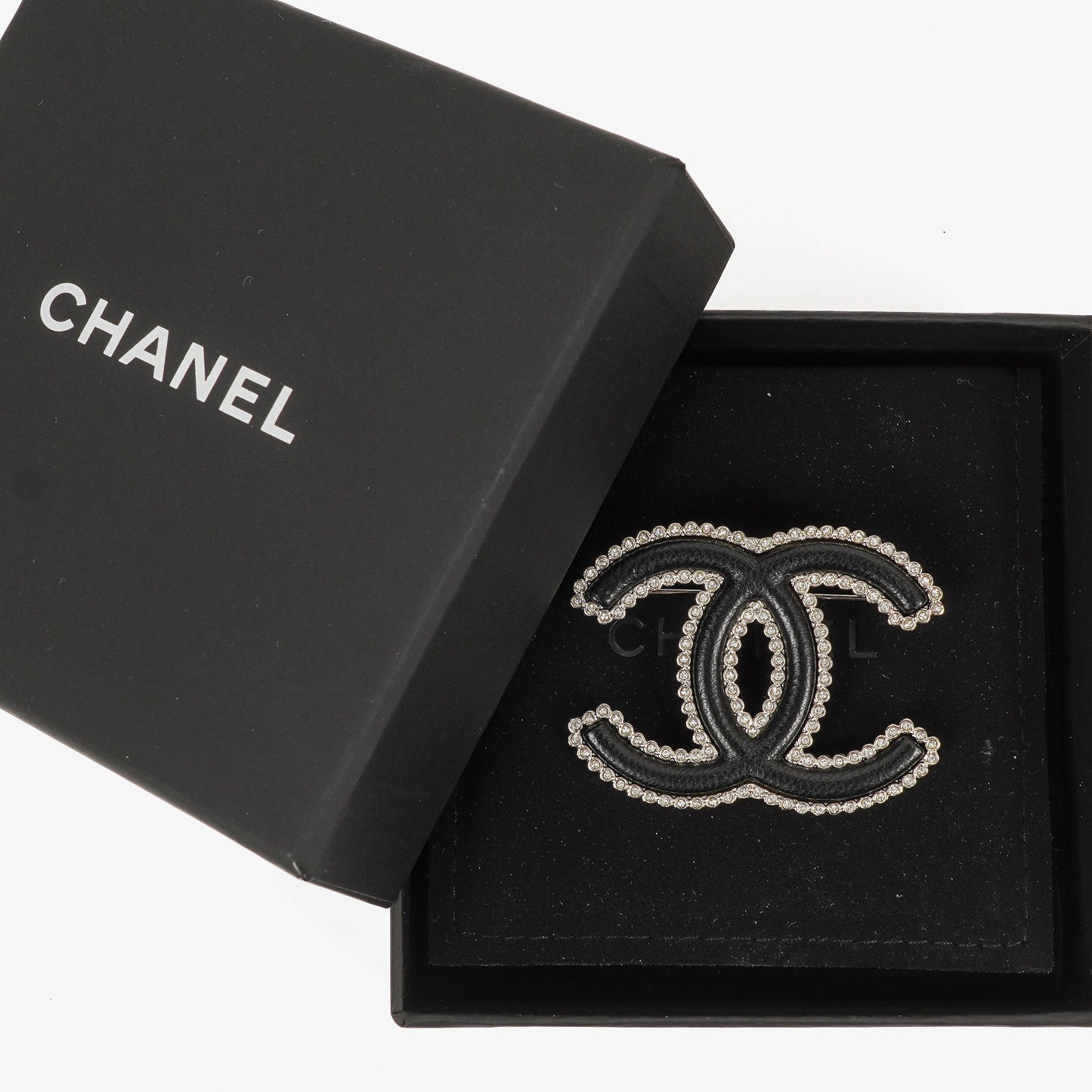 Chanel Metal And Black Leather CC Brooch