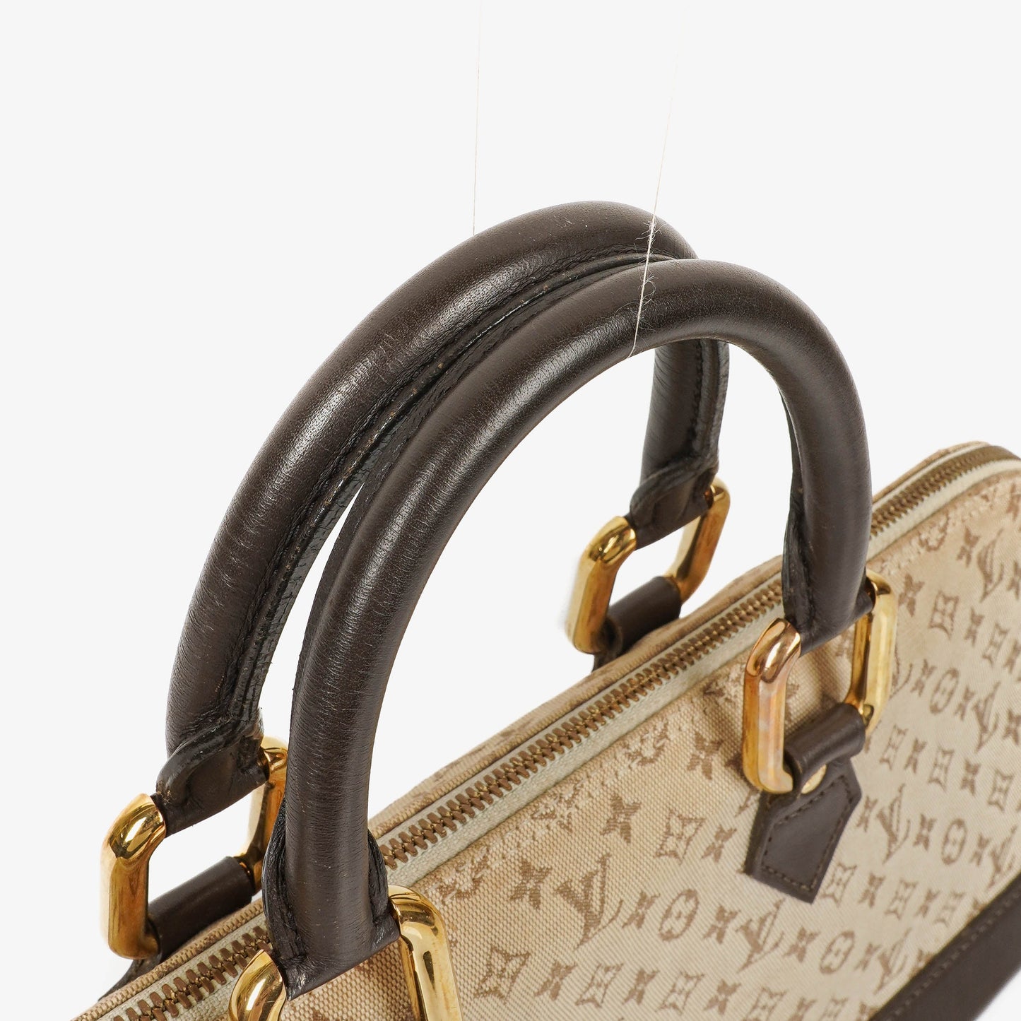 Louis Vuitton Alma Long Brown Monogram Mini Lin Handbag