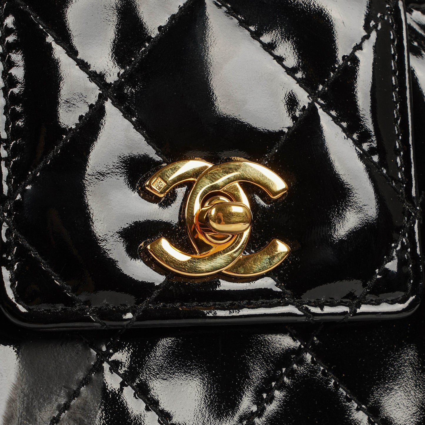 Chanel CC Black Quilted Patent Leather Handbag With 24K Gold-Plated Hardware