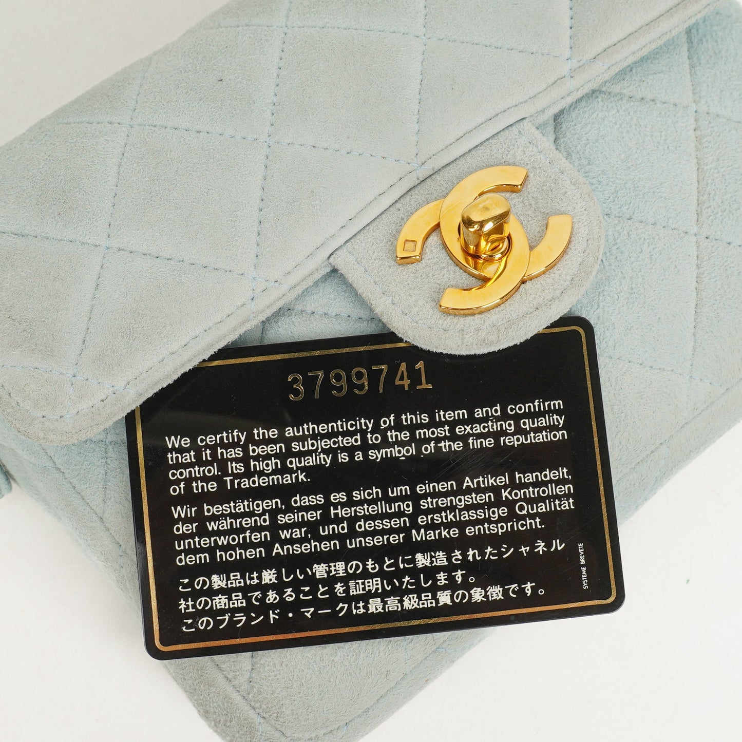 Chanel  Quilted Suede Light Blue Mini Flap Bag