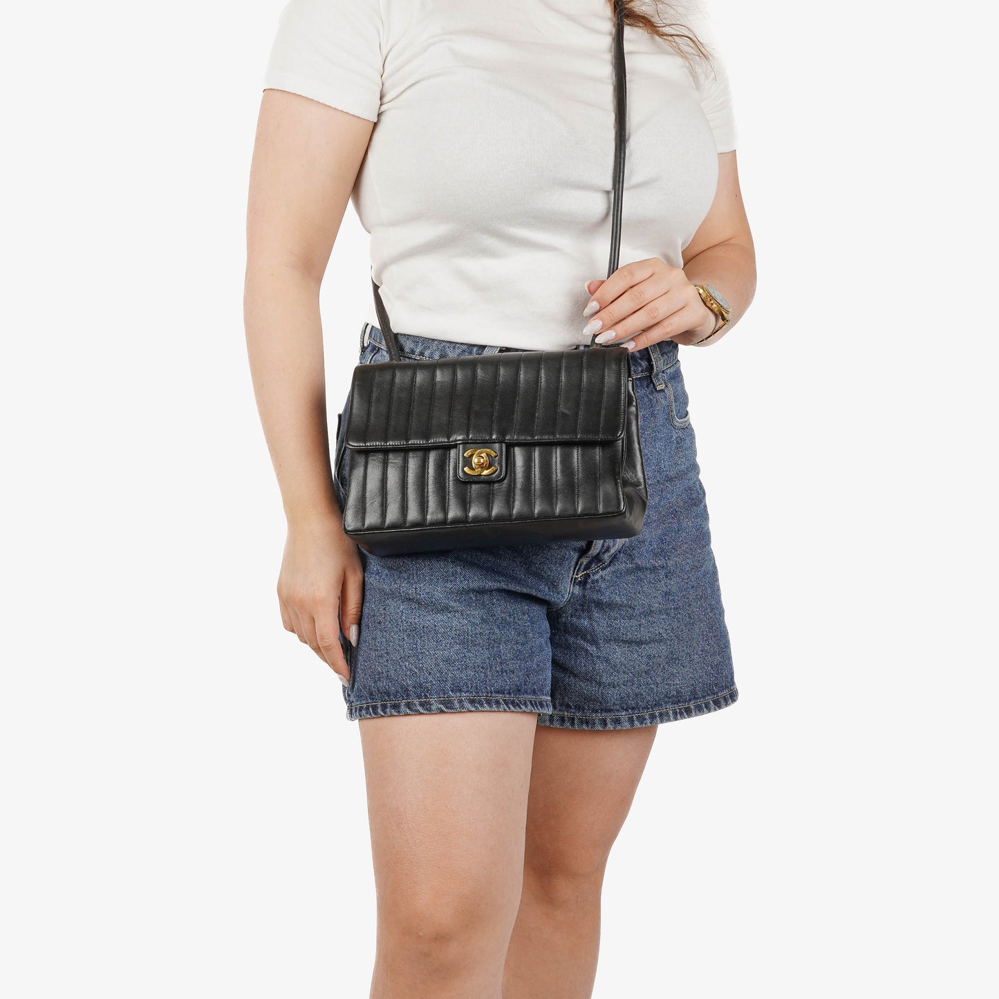 Chanel Vertical Quilted Black Leather Single Flap Bag With 24K Gold-Plated Hardware