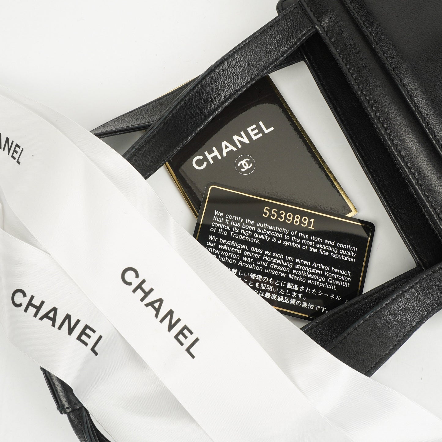 Chanel Black Leather Camellia Top Handle Bag