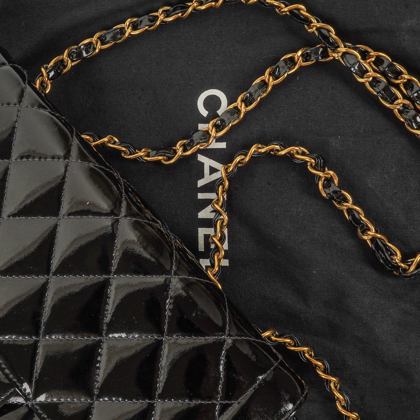 Chanel Single Flap Bag Black Quilted Patent Leather With 24K Gold-Plated Hardware