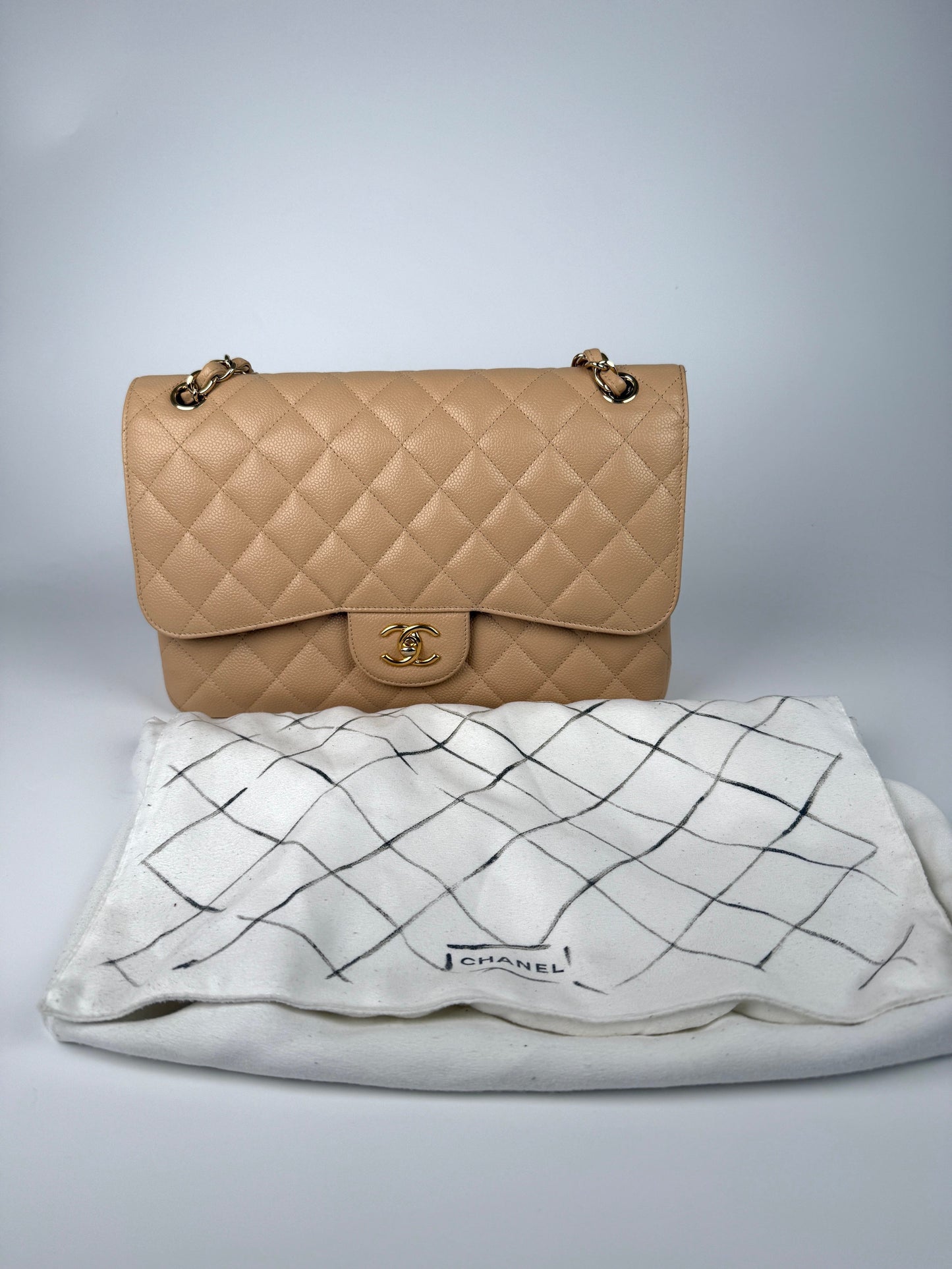 Chanel Light Beige Caviar Jumbo Quilted Flap Bag - Rovelle Bags