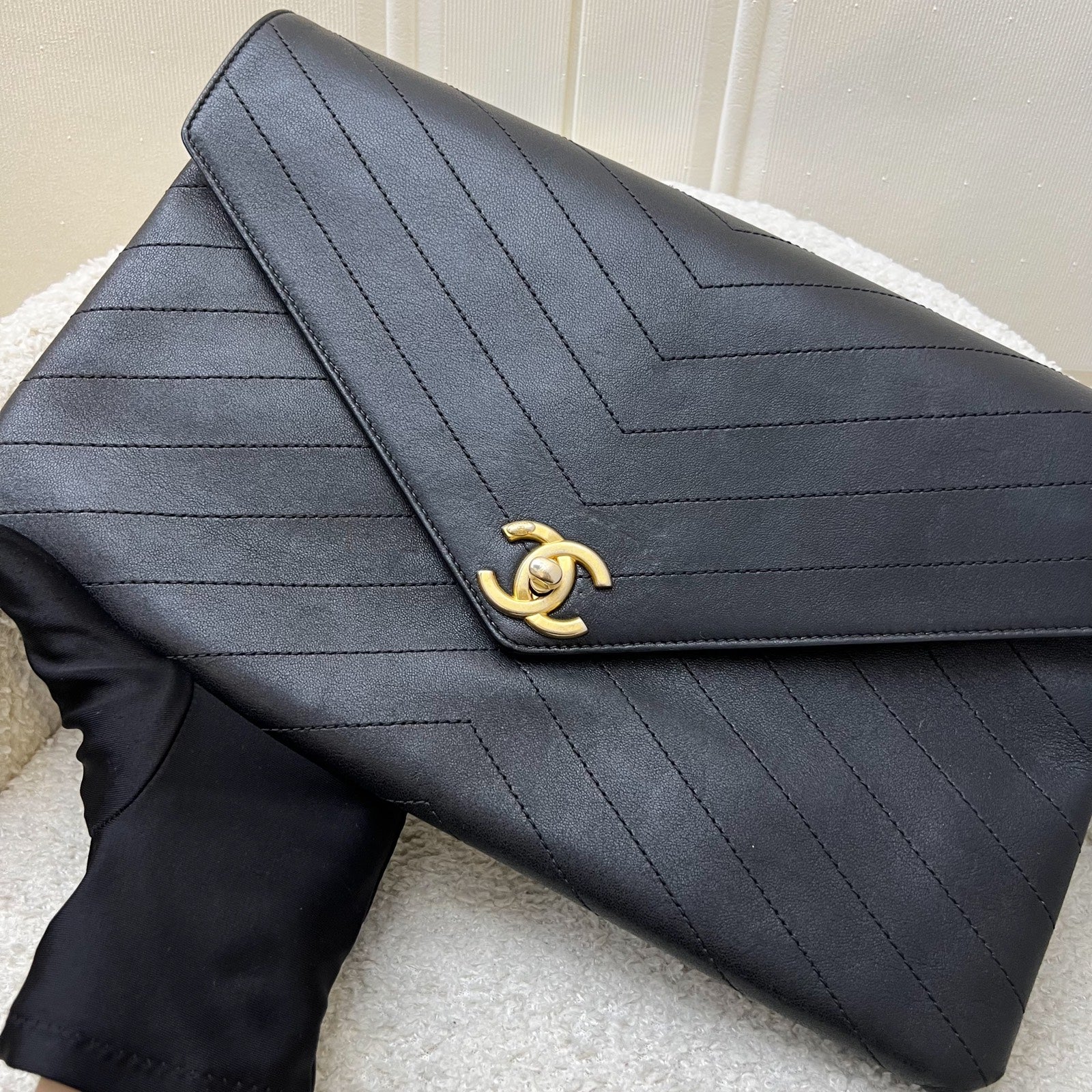 Chanel Clutch in Chevron Quilted Black Clutch Bag - Rovelle Bags