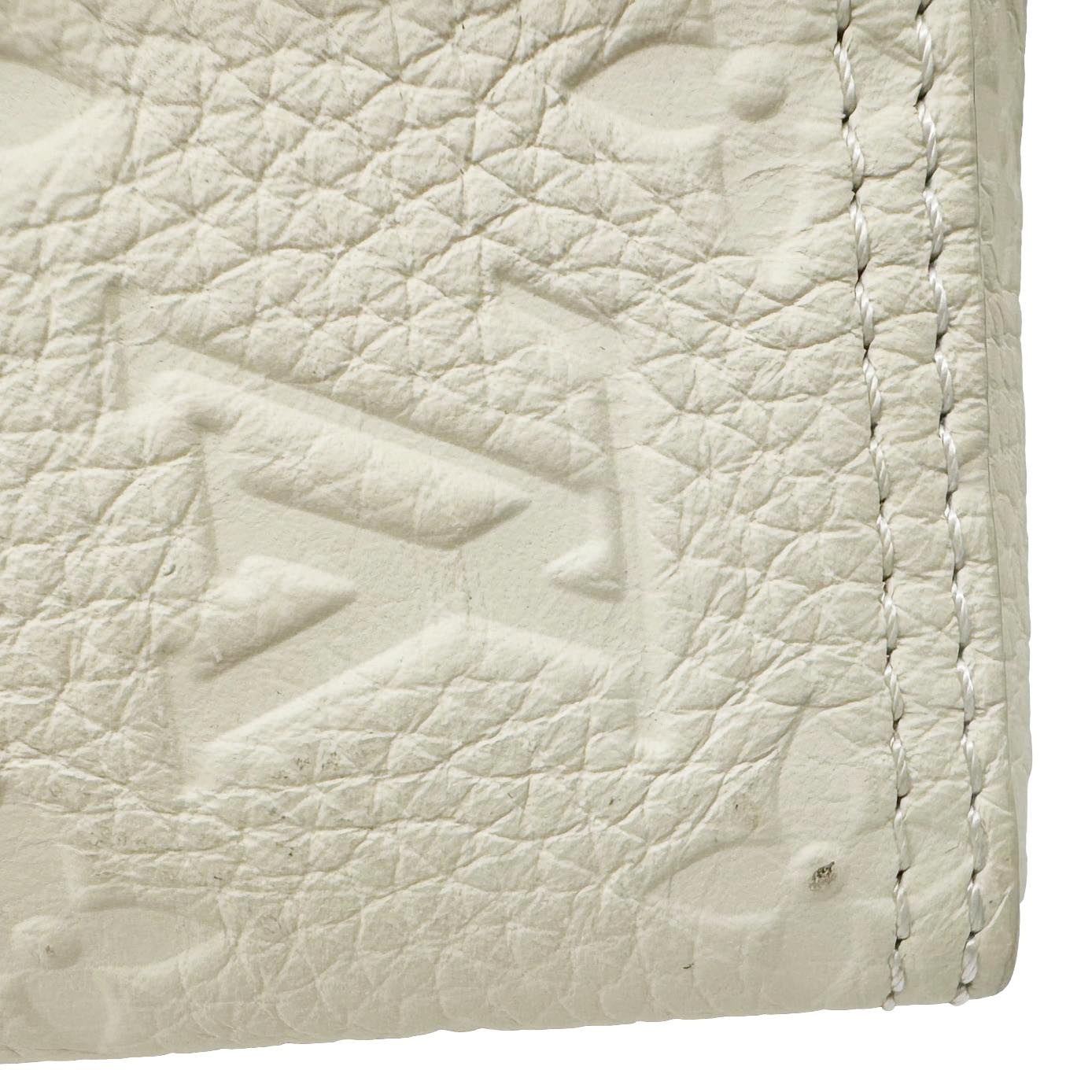 LOUIS VUITTON Triangle Monogram Empreinte Leather Shoulder Bag Off White
