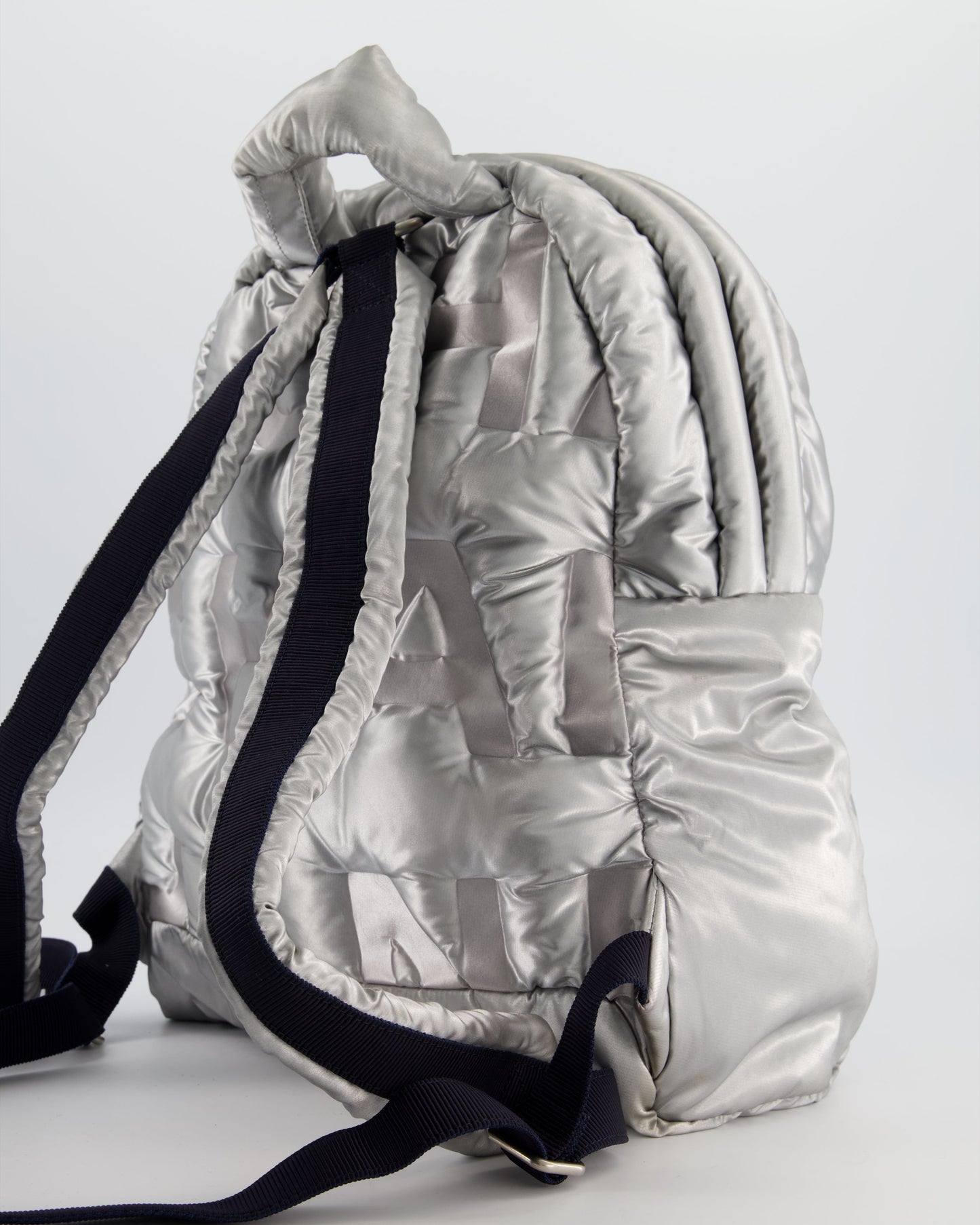 Chanel Silver Doudoune Backpack with Embossed Backpack - Rovelle Bags
