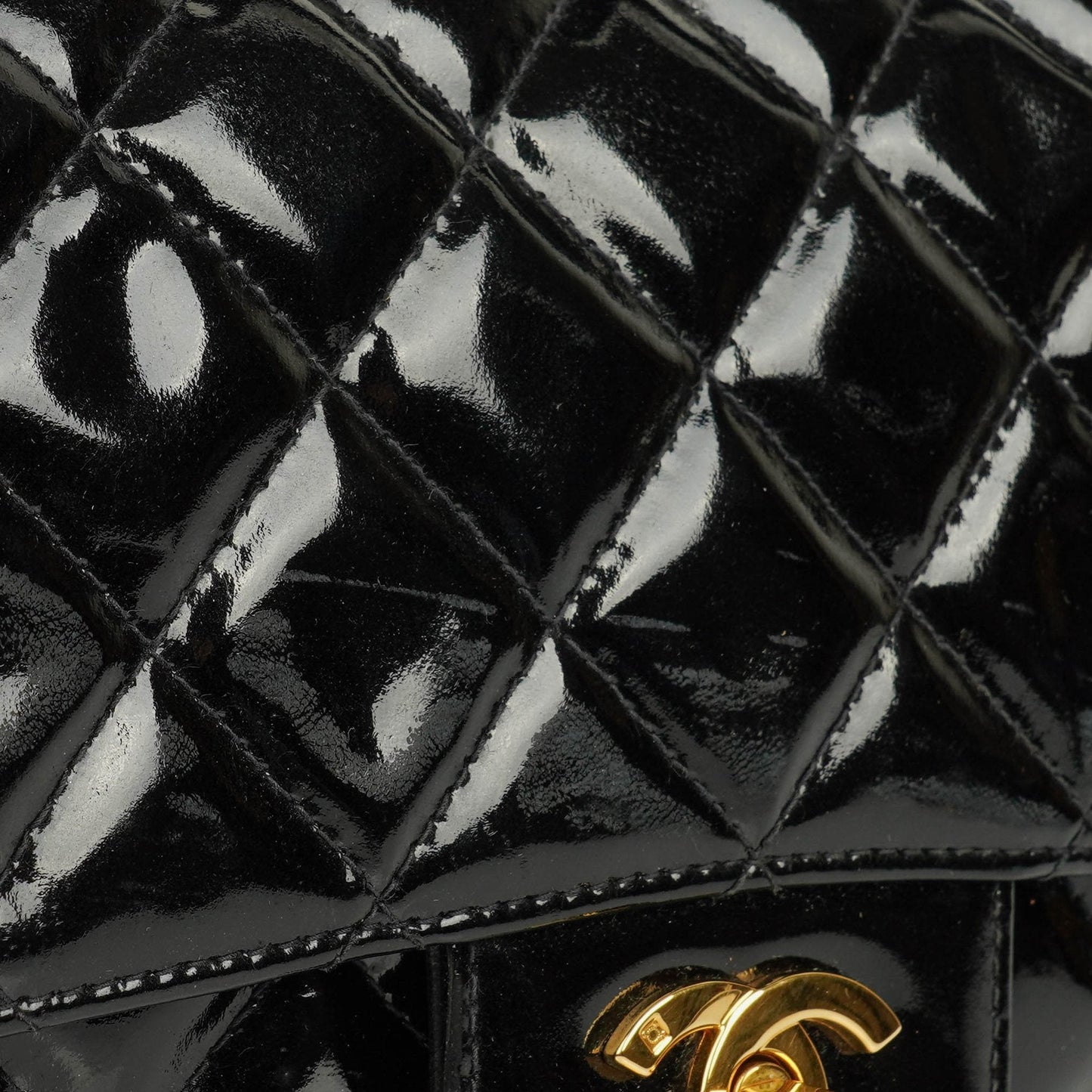 Chanel Black Double-Sided Flap Bag In Quilted Patent Leather