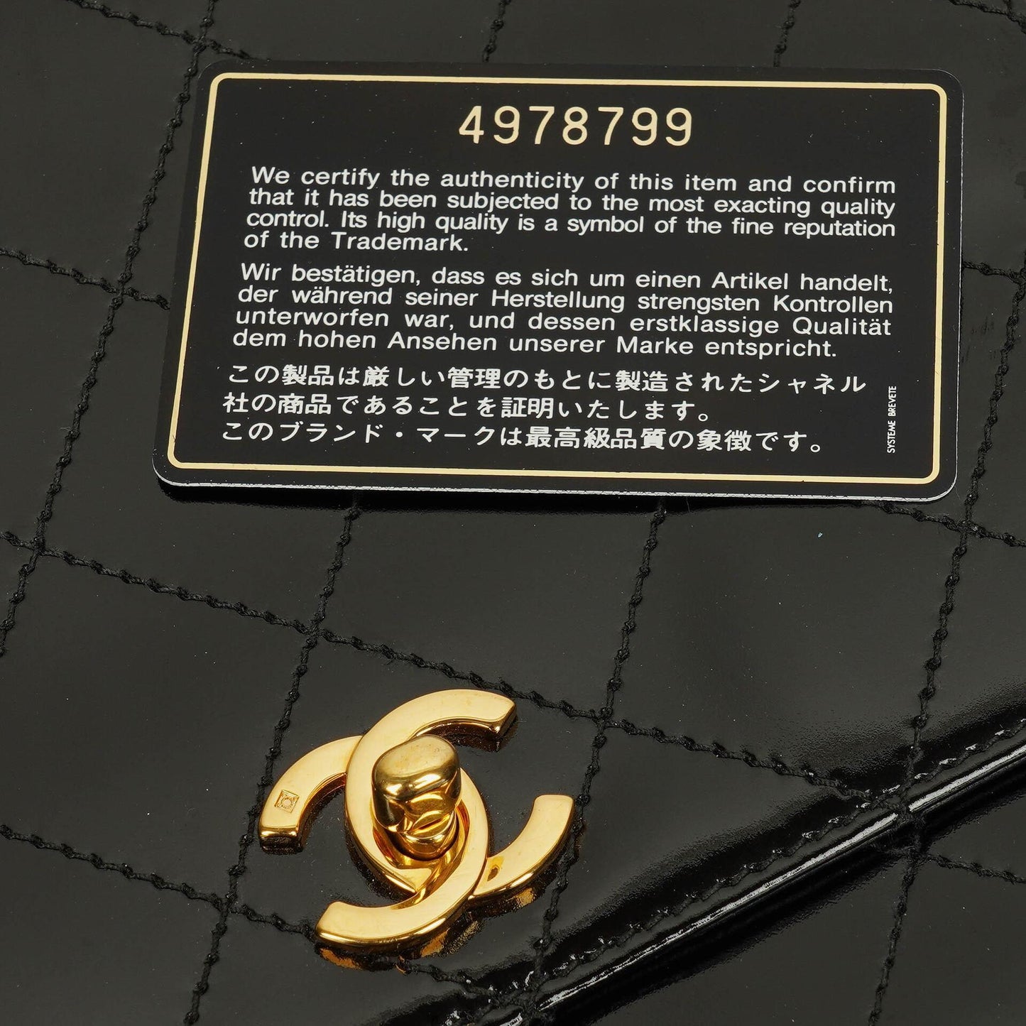 Chanel Black Quilted Patent Leather Top Handle Flap Bag With 24K Gold-Plated Hardware