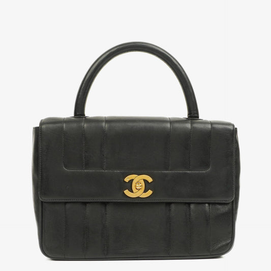 Chanel Kelly Black Vertical Quilted Lambskin Flap Bag With 24K Gold-Plated Hardware