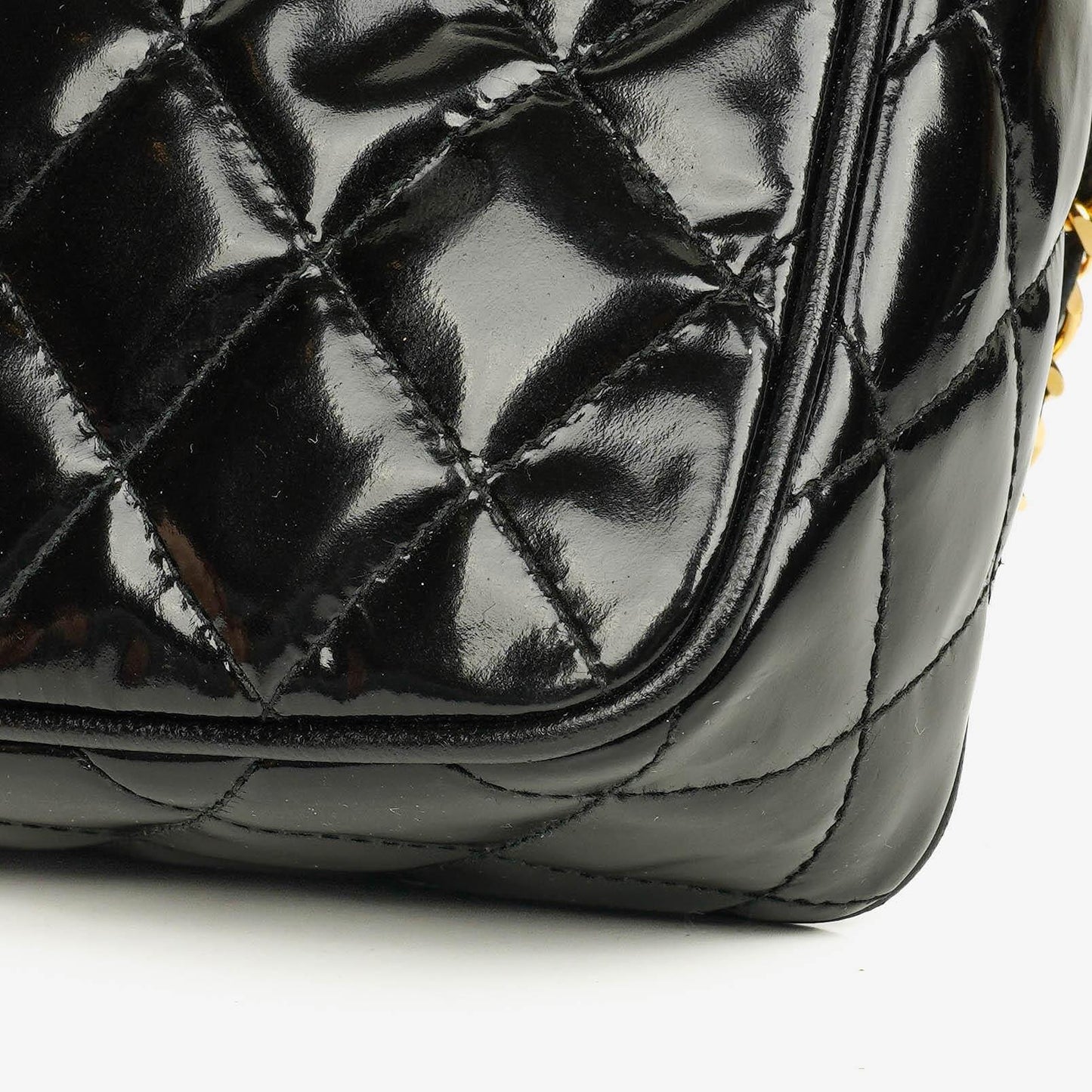 Chanel CC Black Quilted Patent Leather Camera Tassel Bag