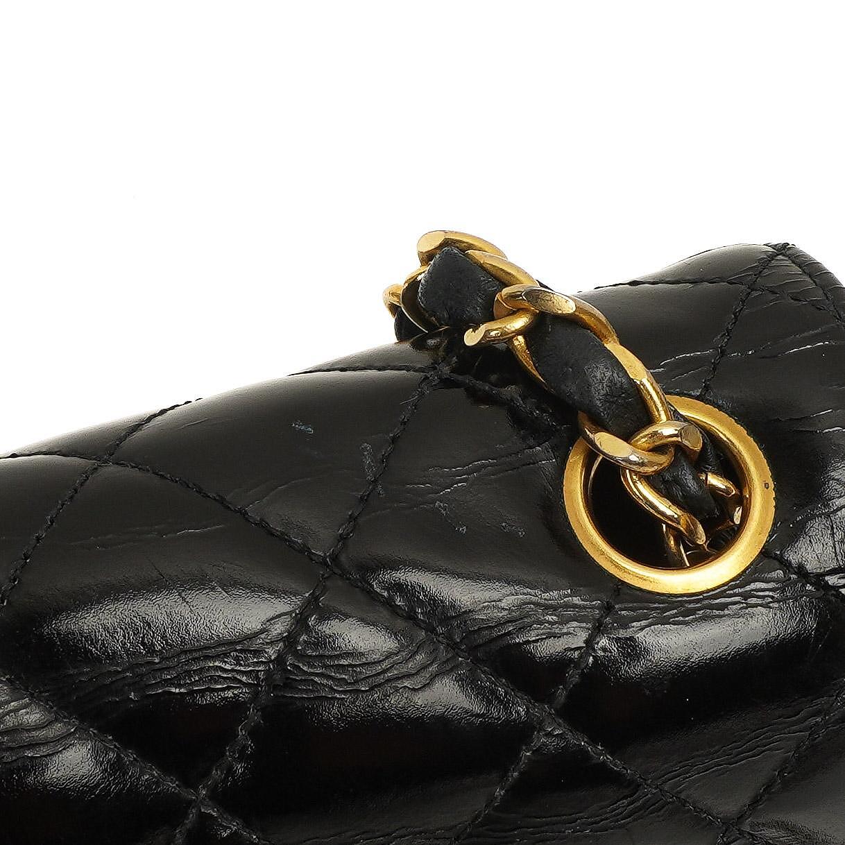 Chanel Classic Maxi Logo Full Flap Bag Black Quilted Patent Leather With 24K Gold-Plated Hardware