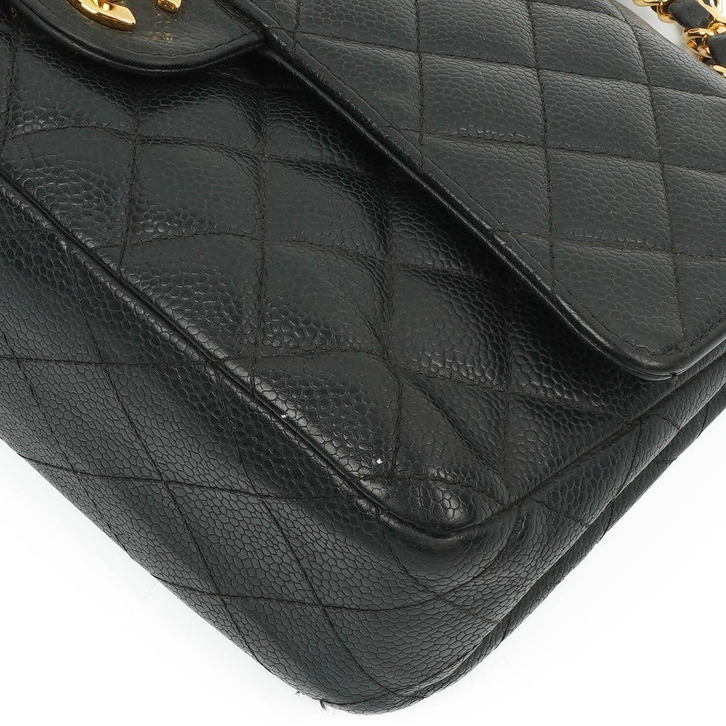 Chanel Classic Medium Double Flap Bag In Black Quilted Caviar Leather With 24K Gold-Plated Hardware