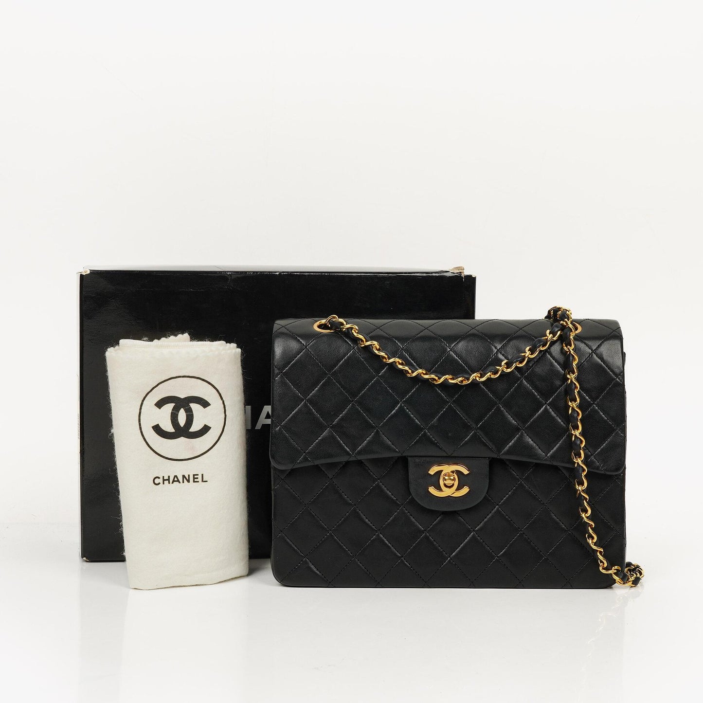 Chanel Classic Square Black Quilted Lambskin Double Flap Bag With 24K Gold-Plated Hardware, 1986-1988