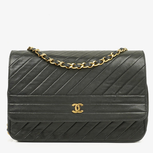 Chanel Diagonal Medium Classic Black Quilted Lambskin Single Flap Bag With 24K Gold-Plated Hardware