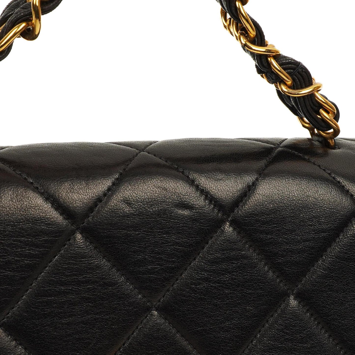 Chanel Flap Bag In Black Quilted Lambskin With Chain Top Handle And 24K Gold-Plated Hardware, 1994-1996