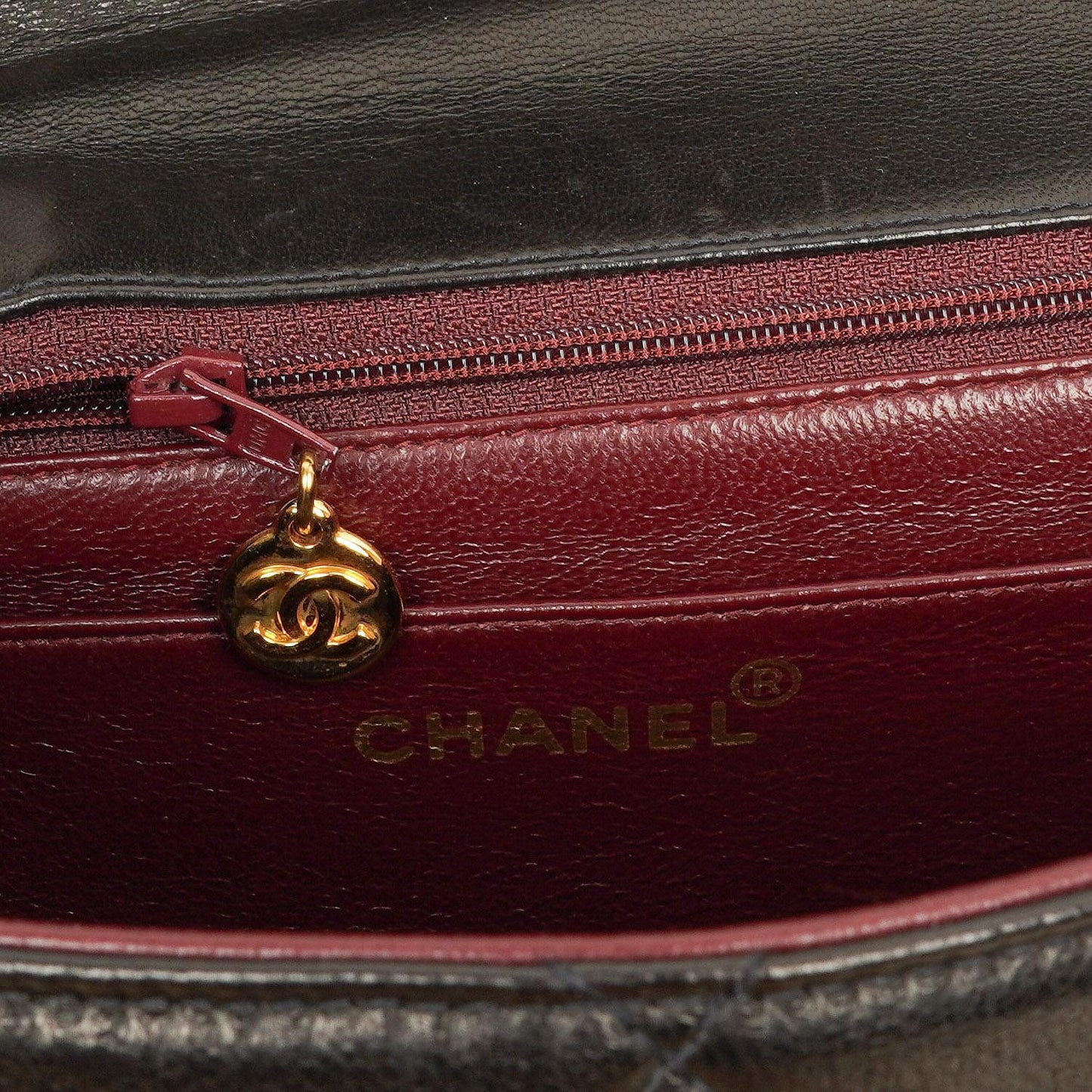 Chanel Flap Bag In Black Quilted Lambskin With Chain Top Handle And 24K Gold-Plated Hardware, 1994-1996