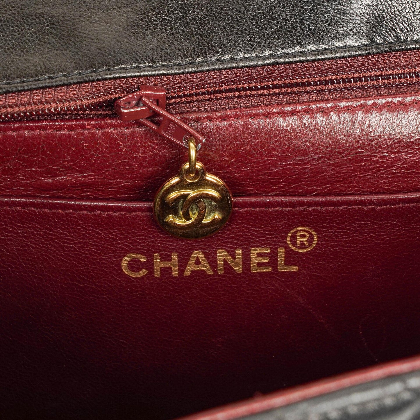Chanel Flap Bag In Black Quilted Lambskin With Chain Top Handle And 24K Gold-Plated Hardware