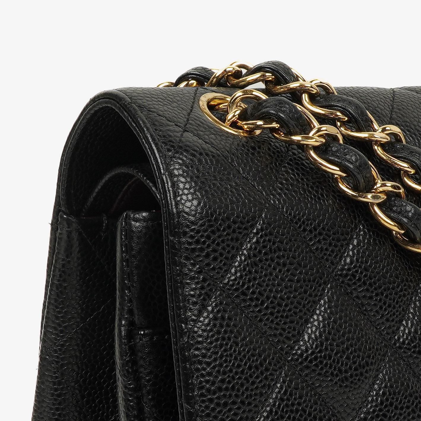 Chanel Jumbo Classic Double Flap Bag Black Quilted Caviar Gold-Tone Hardware
