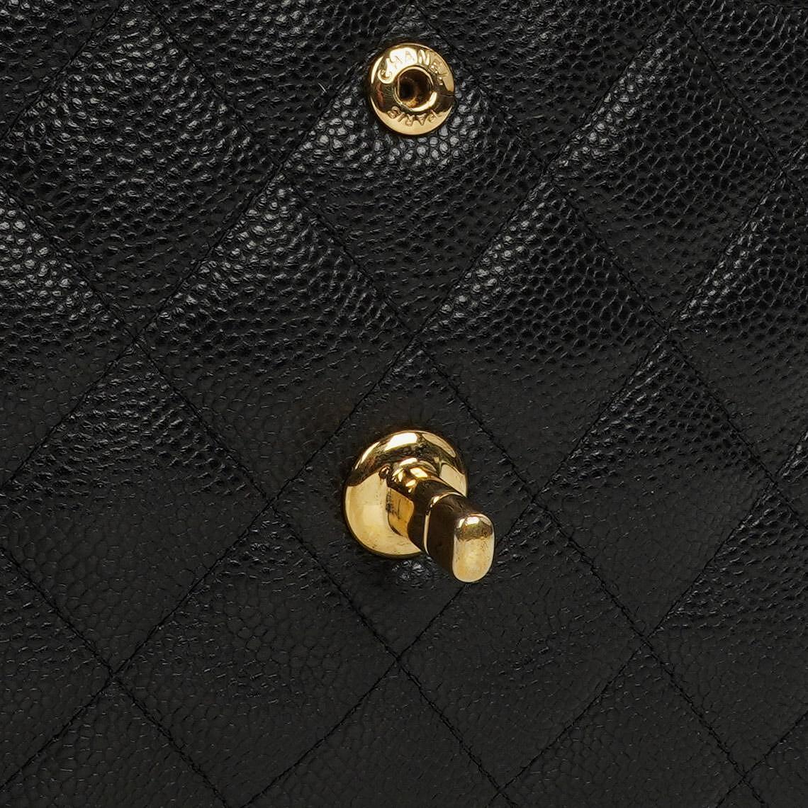 Chanel Jumbo Classic Double Flap Bag Black Quilted Caviar Gold-Tone Hardware