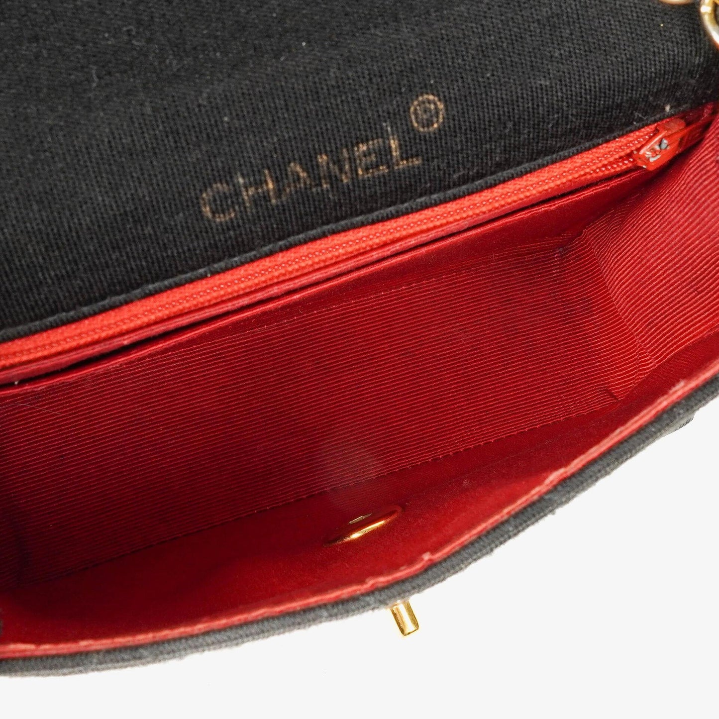 Chanel Mini Quilted Square Jersey Black Flap Bag With 24K Gold-Plated Hardware