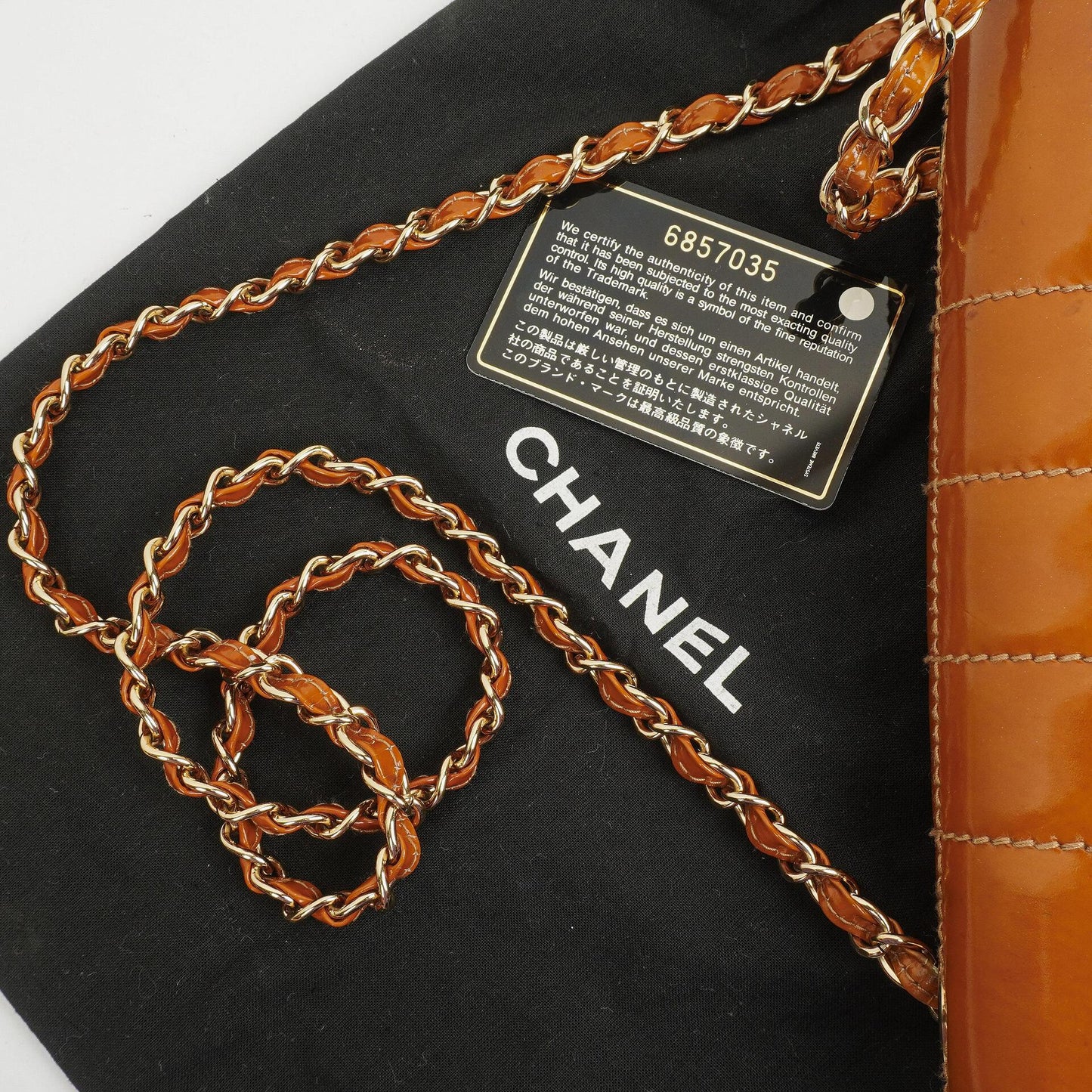 Chanel Quilted Patent Leather Chocolate Bar Flap Bag
