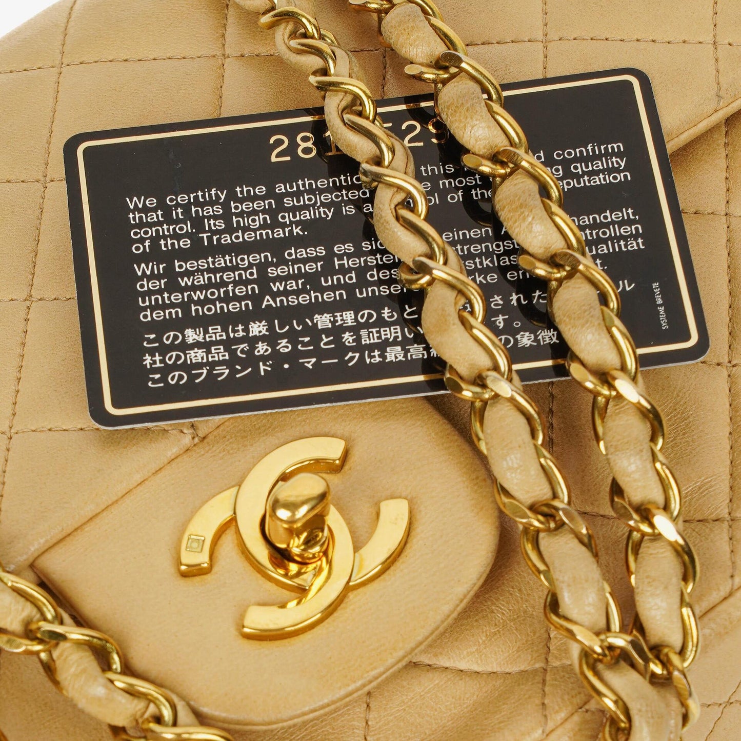 Chanel Timeless Classic Medium Double Flap Bag In Beige Quilted Lambskin And 24K Gold-Plated Hardware