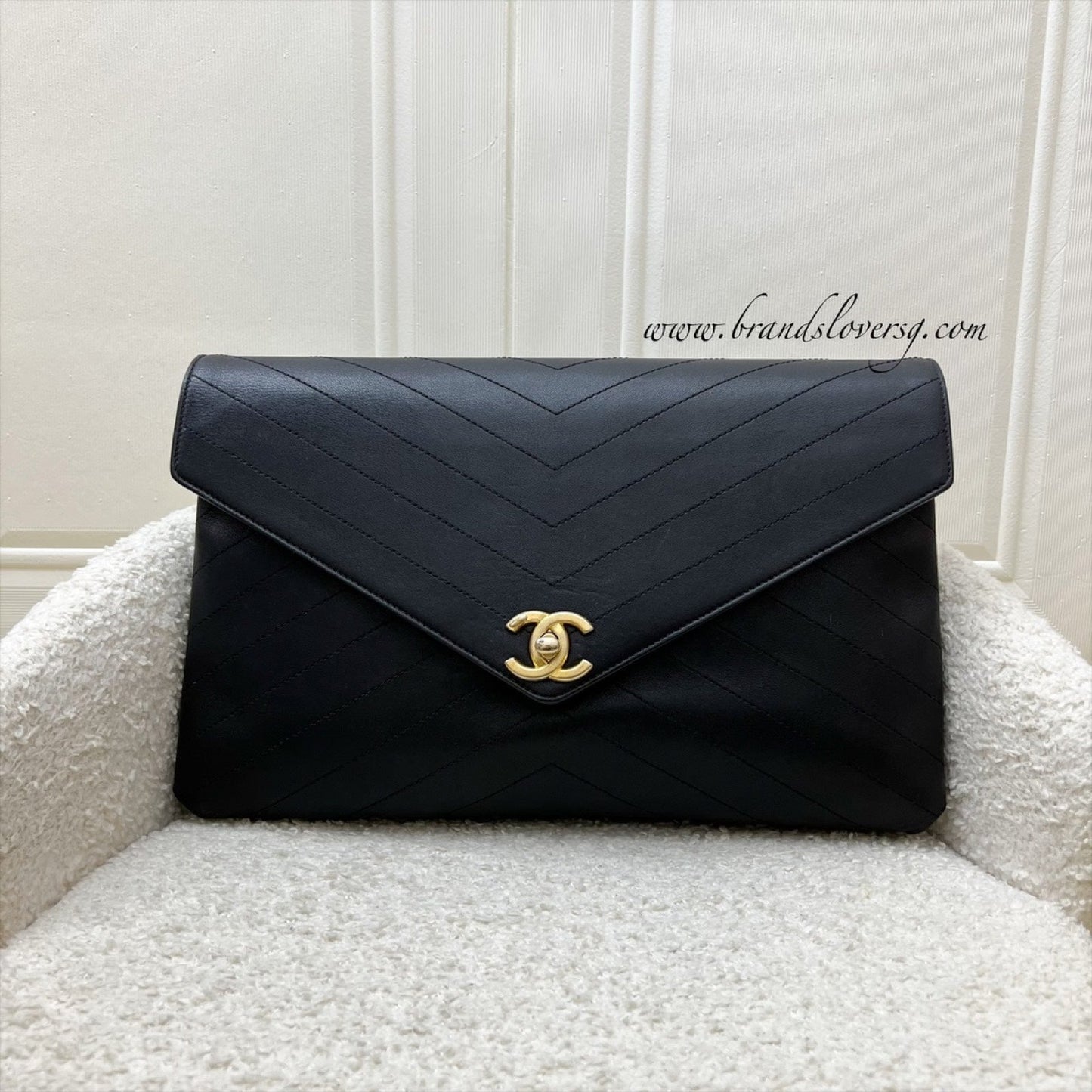 Chanel Clutch in Chevron Quilted Black Clutch Bag - Rovelle Bags