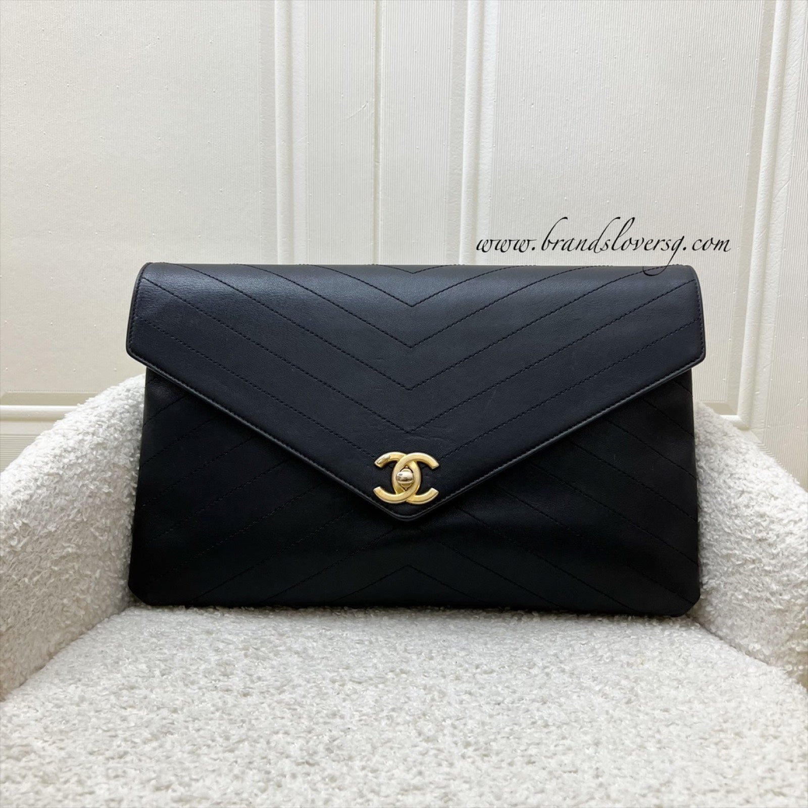 Chanel Clutch in Chevron Quilted Black Clutch Bag - Rovelle Bags