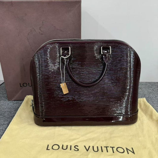 Louis Vuitton Alma Bag Amarante Handbag